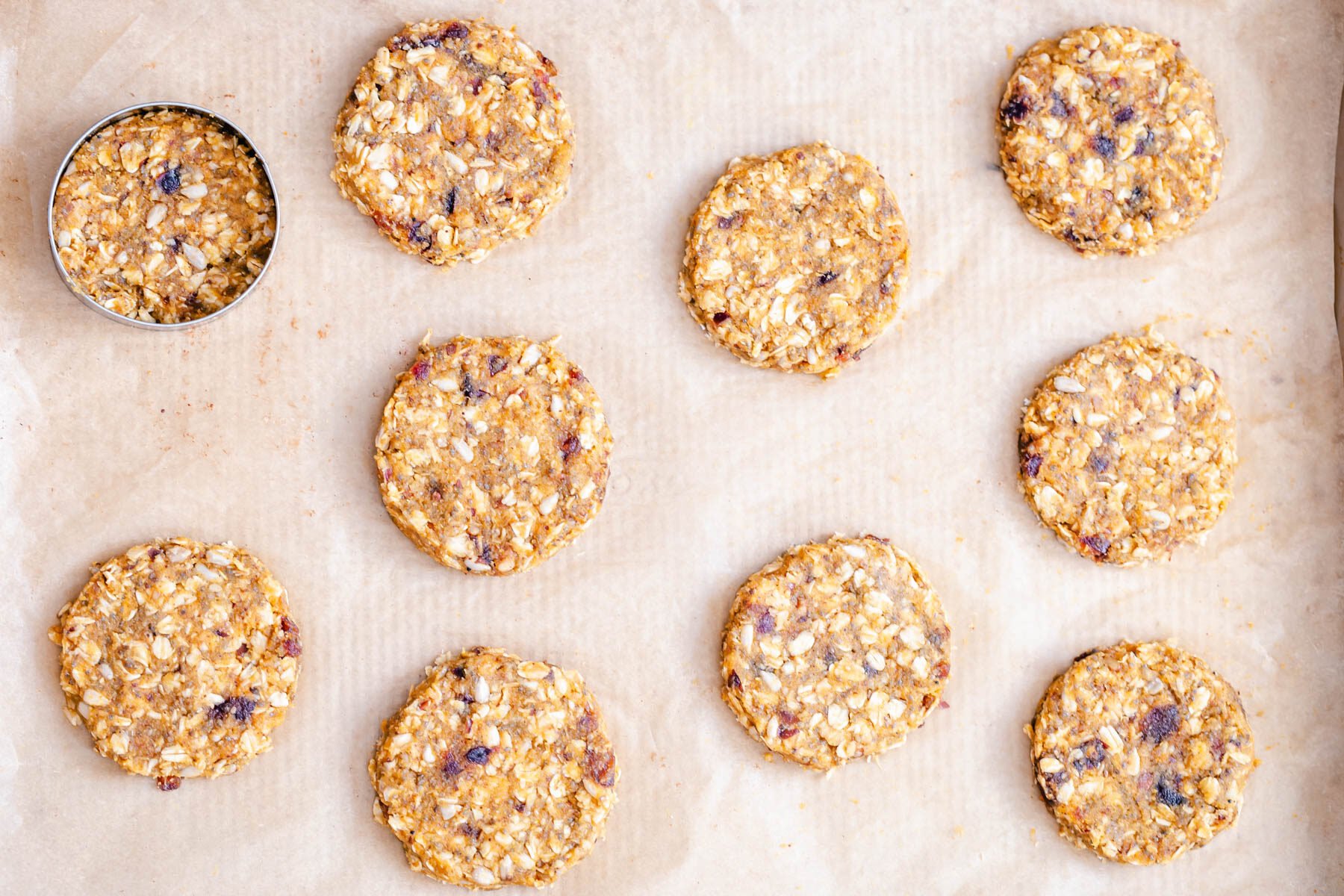 pumpkin breakfast cookies  unbaked pumpkin breakfast cookies on a cookie sheet