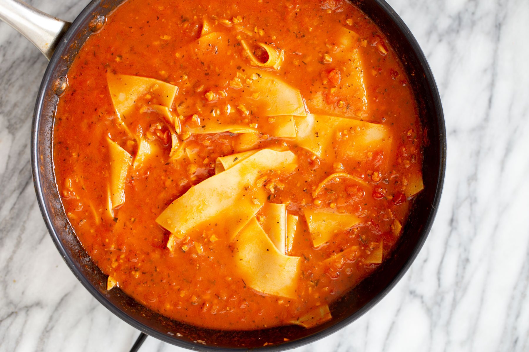 vegan skillet lasagna bolognese in a black skillet