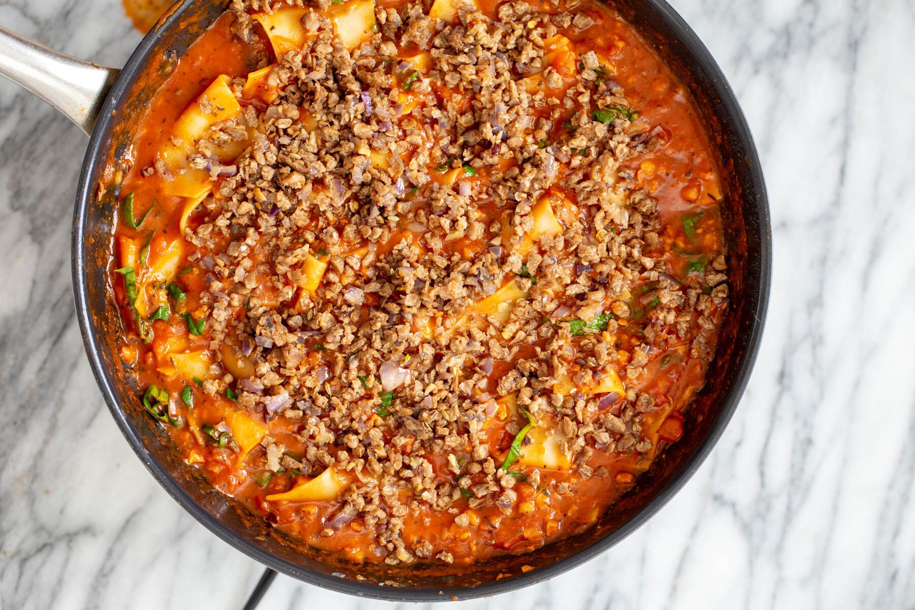 vegan cast iron skillet lasagna with vegan meat crumbles