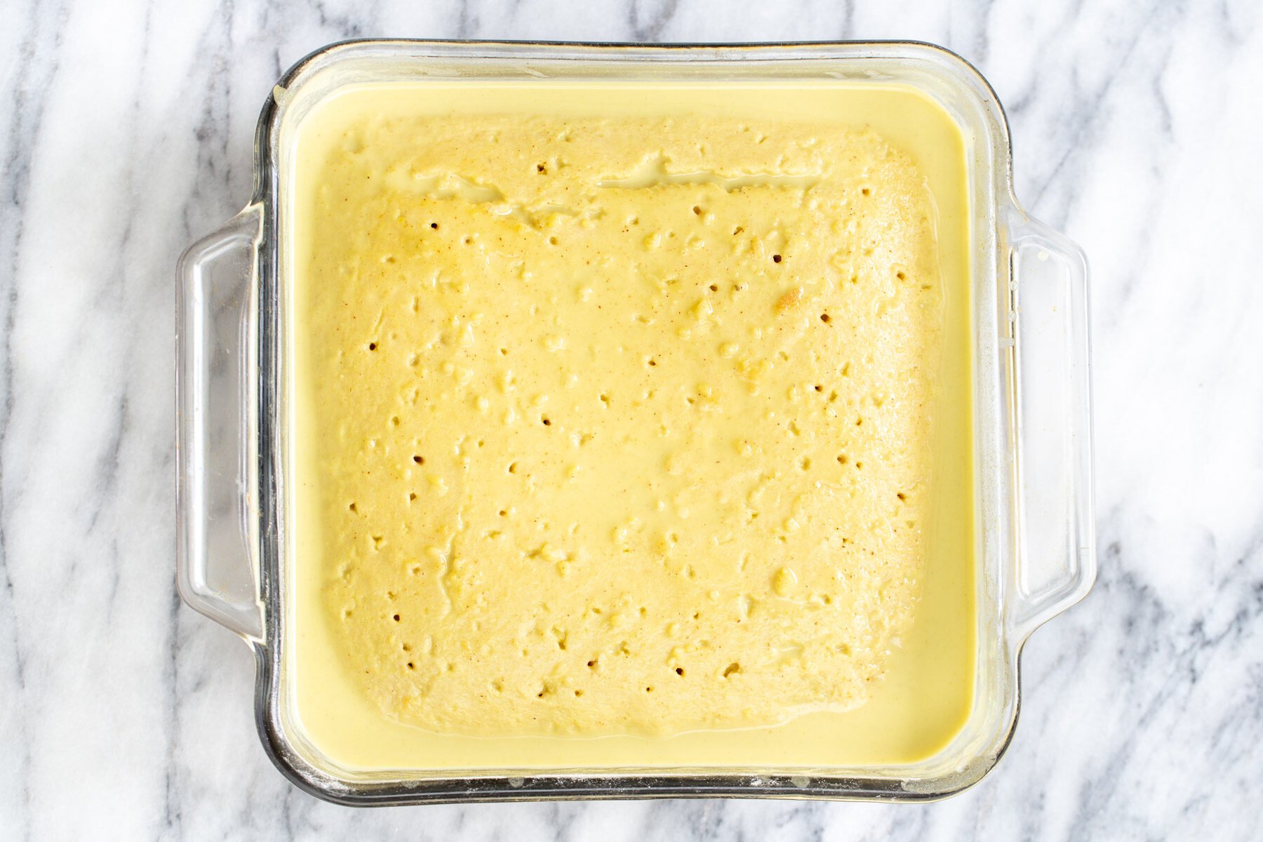 a soaked vegan tres leches cake after chilling