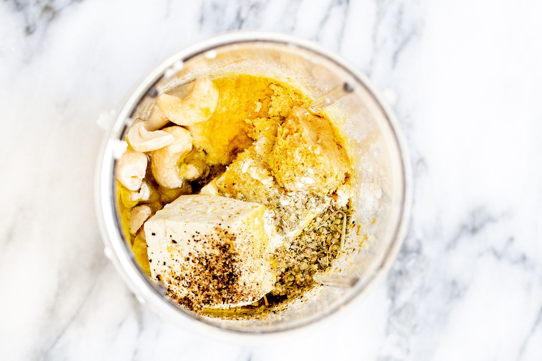 vegan butternut squash lasagna ingredients for vegan cashew bechamel sauce in a blender