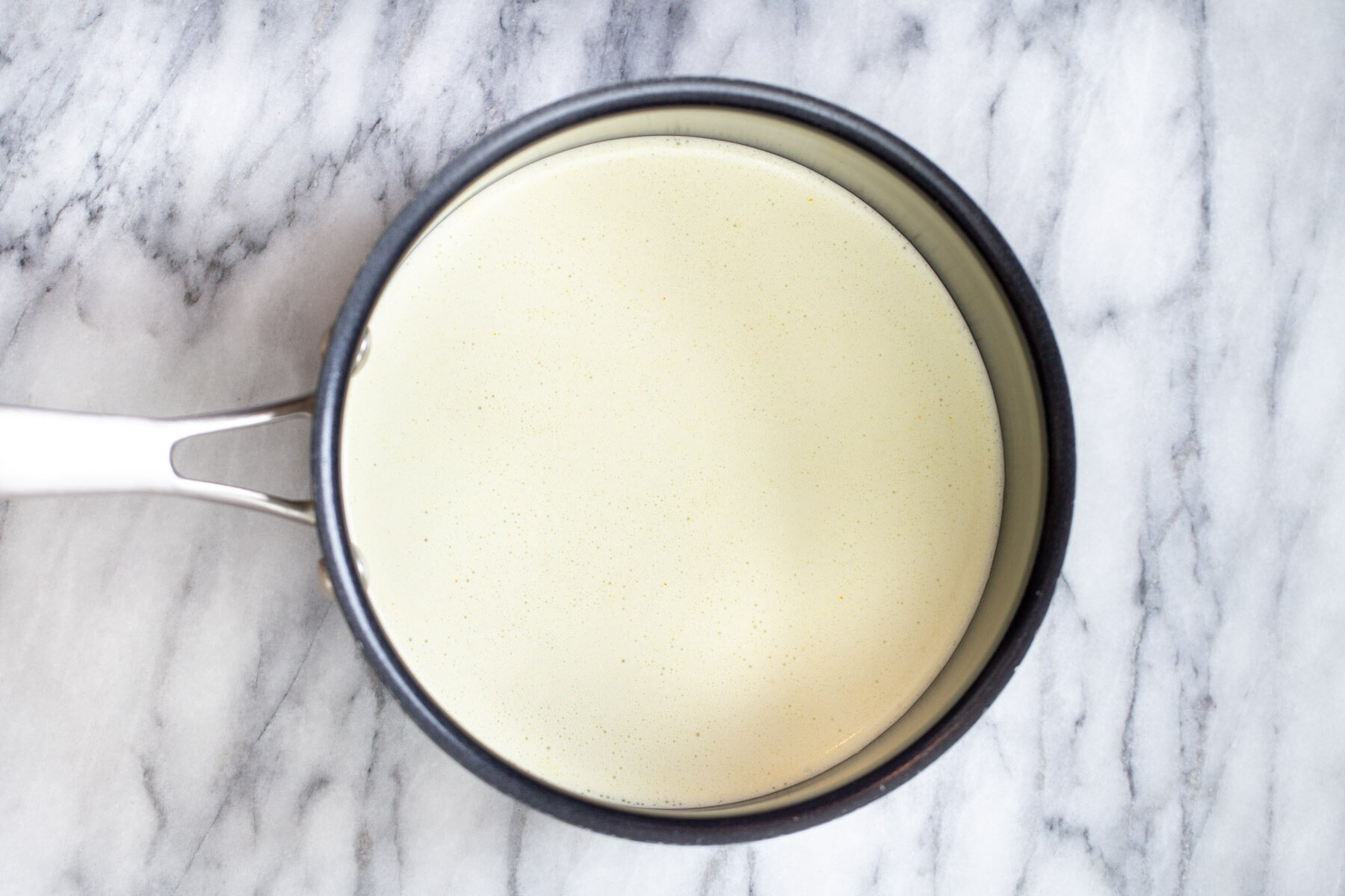 rabri recipe nut milk in a saucepan
