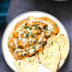 tofu malai curry served with rice and bread