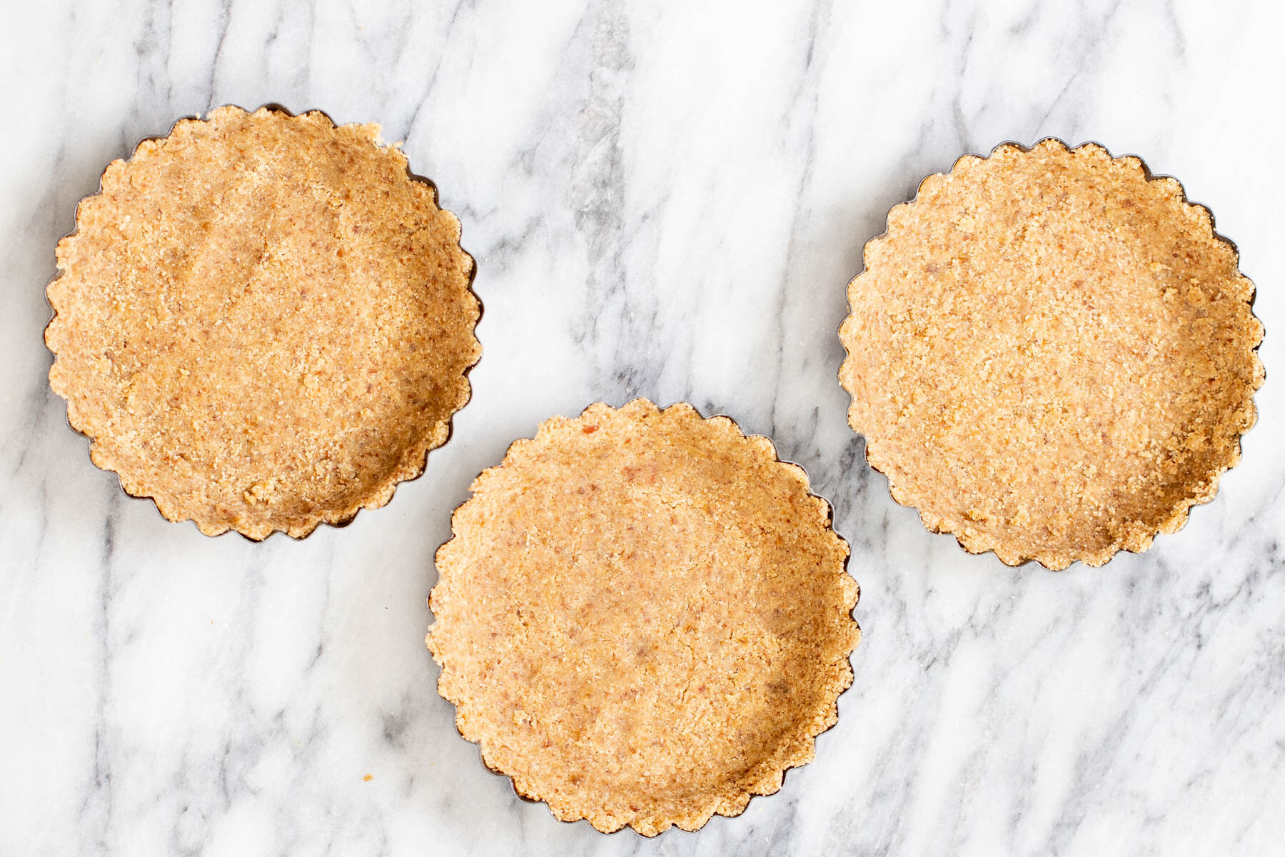three little tart shells with vegan glutenfree pie crust