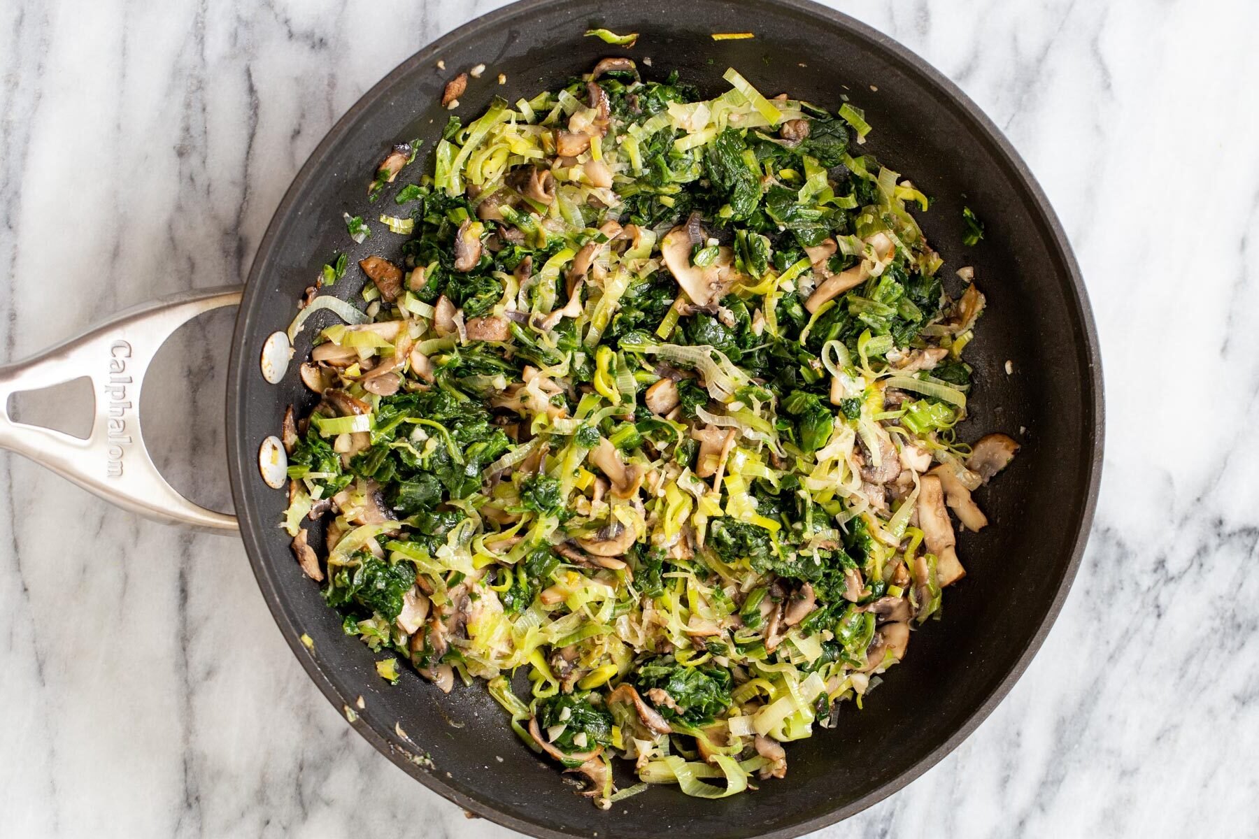 sauteed veggies in a frying pan