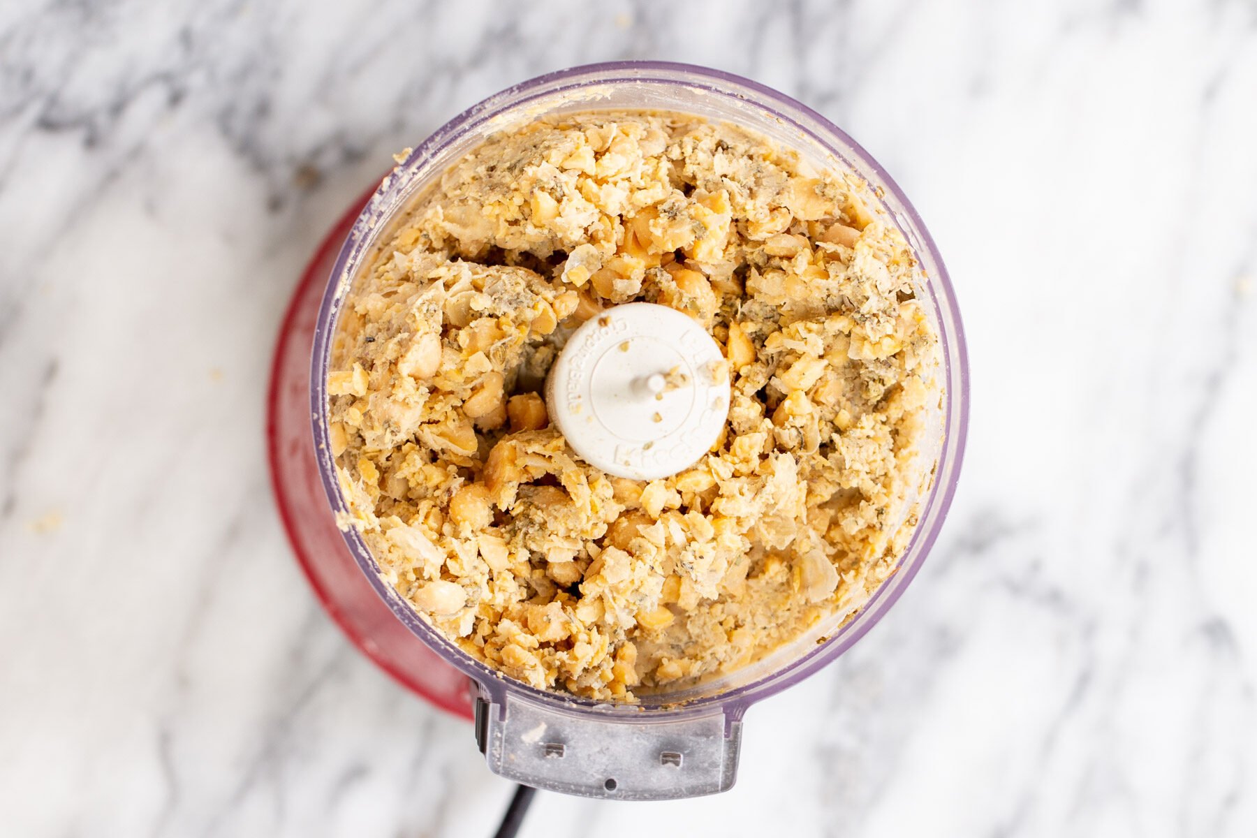 vegan stuffing vegan chickpea sausage mixture in a food processor