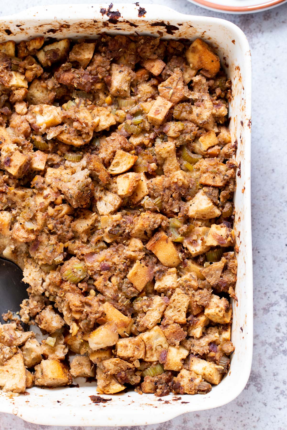 vegan stuffing  vegan stuffing in a white casserole dish