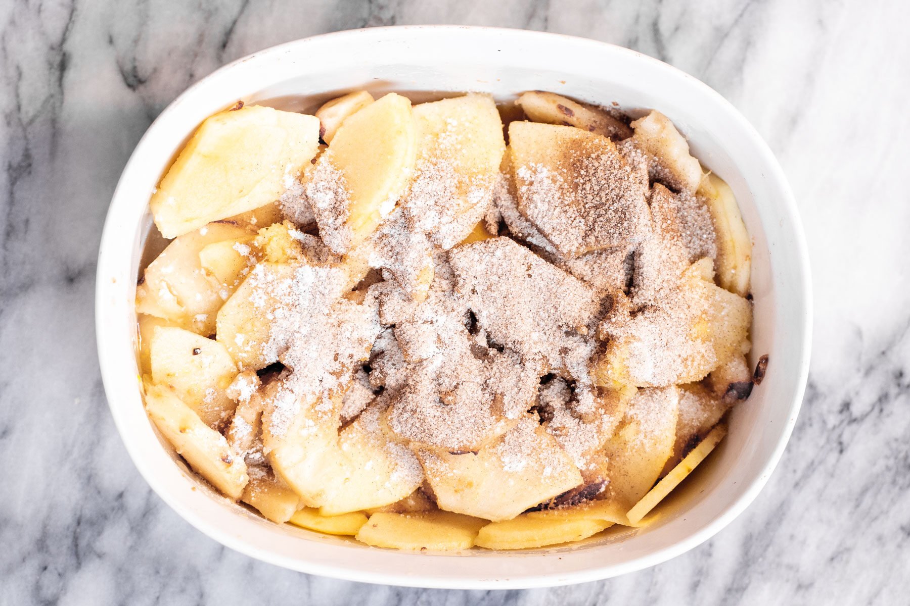 apple pear crisp  apple and pear sliced dusted with cinnamon sugar