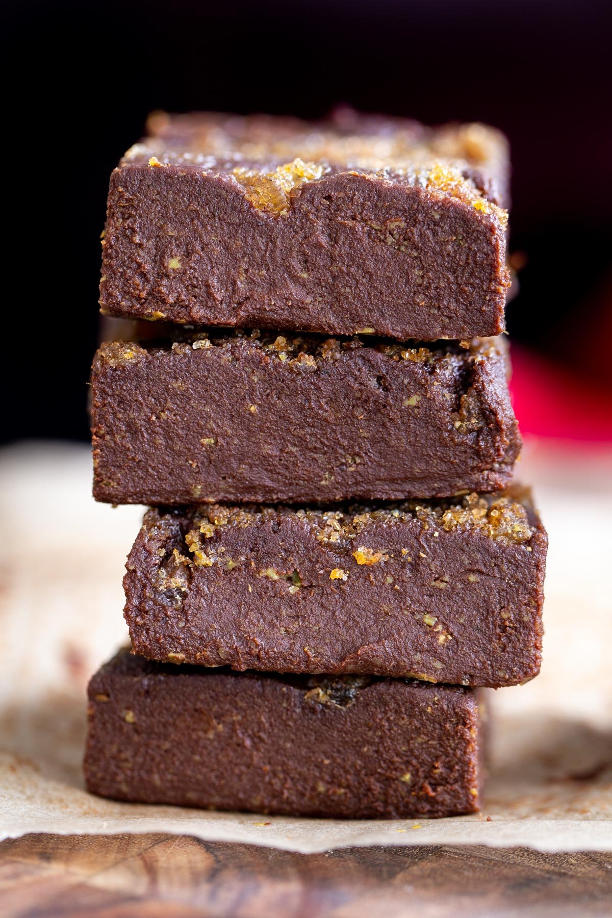 vegan gingerbread fudge  a stack of vegan gingerbread fudge topped with crystalized ginger and brown sugar
