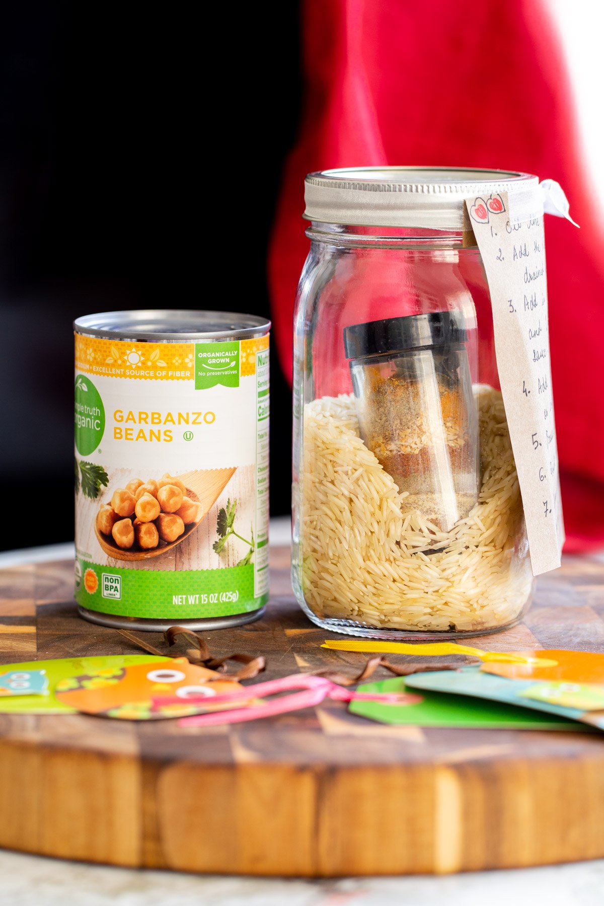 chickpea fried rice mix in a jar next to a can of chickpeas