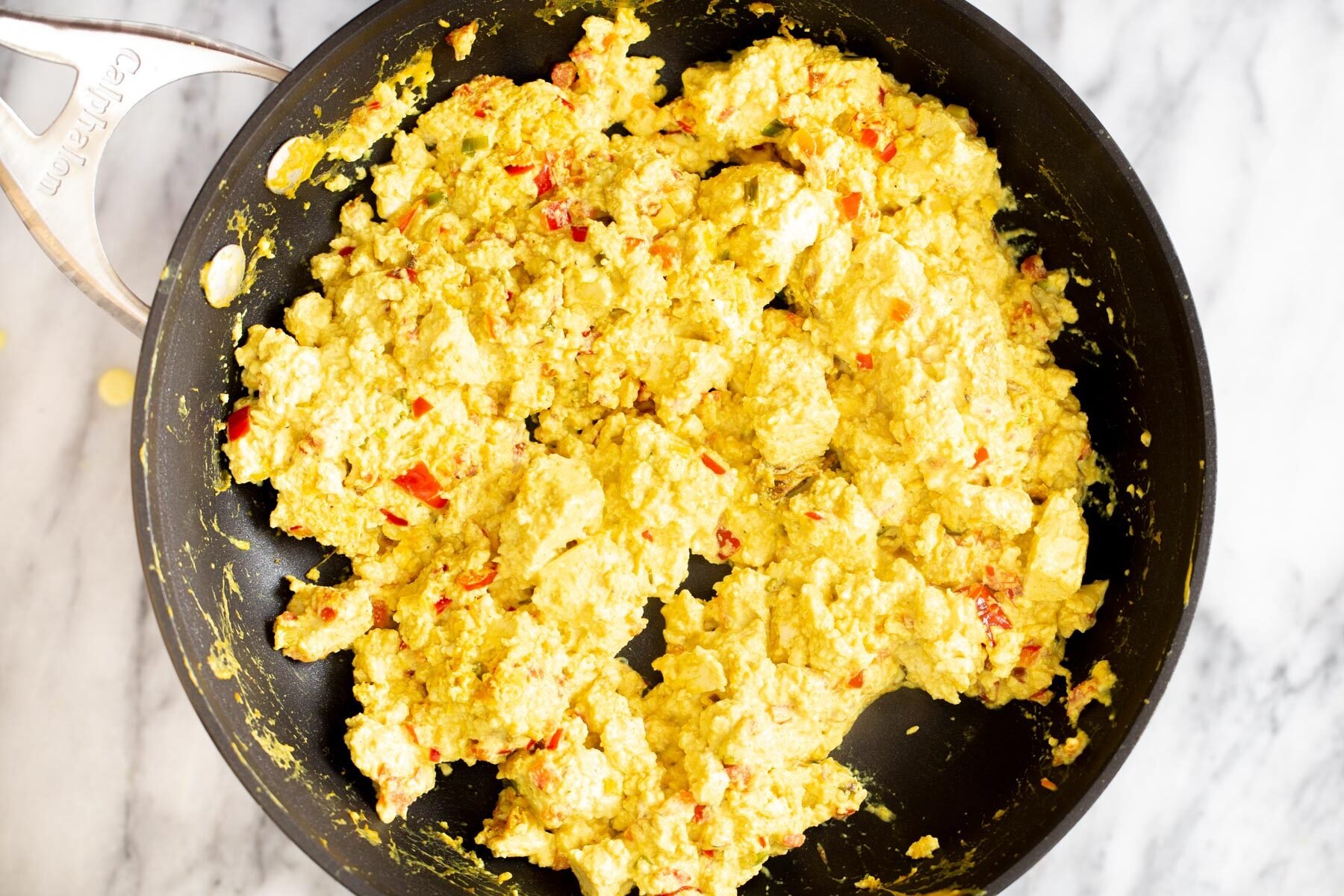 vegan tofu scramble in a black skillet