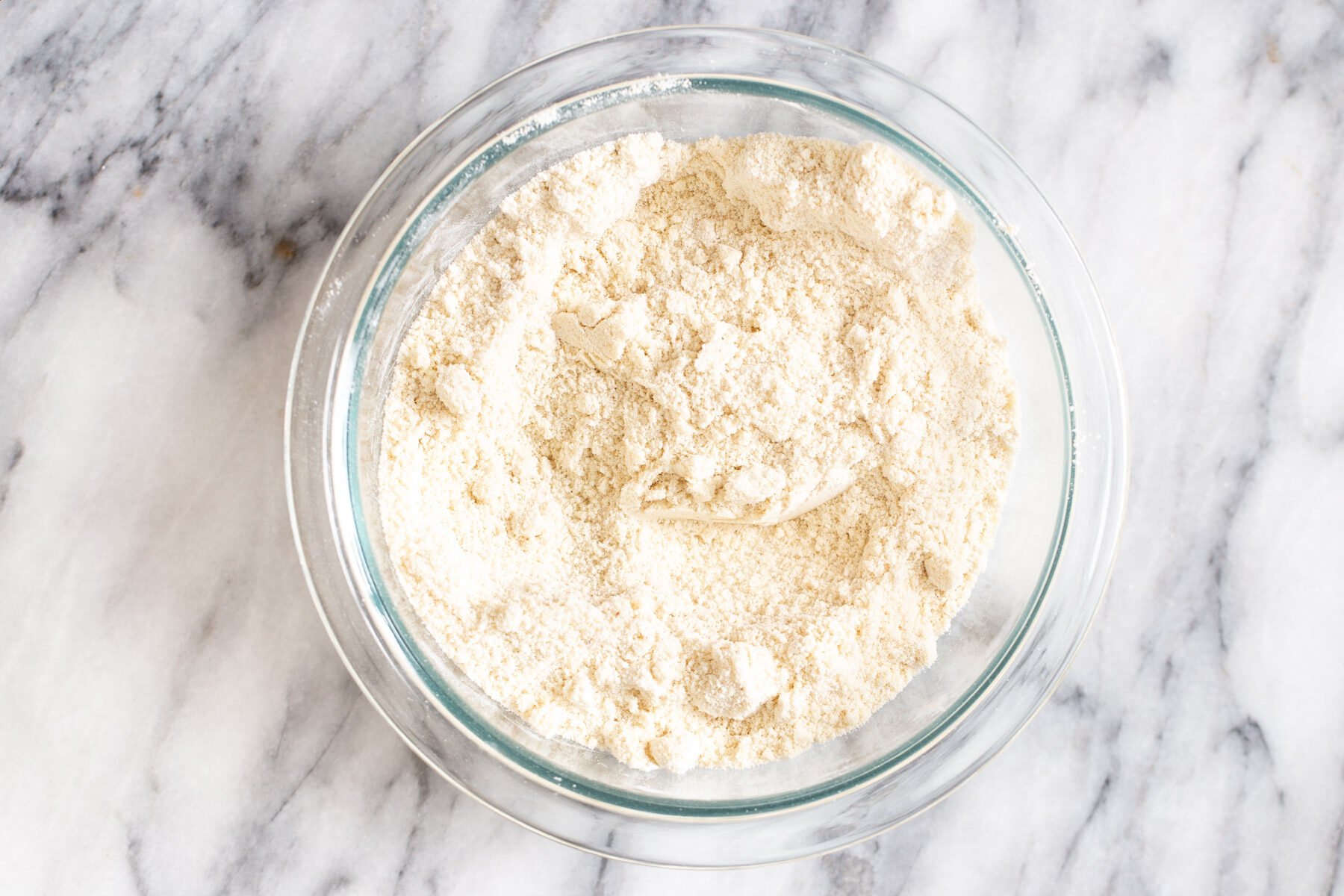 dry cookie mix in a glass bowl