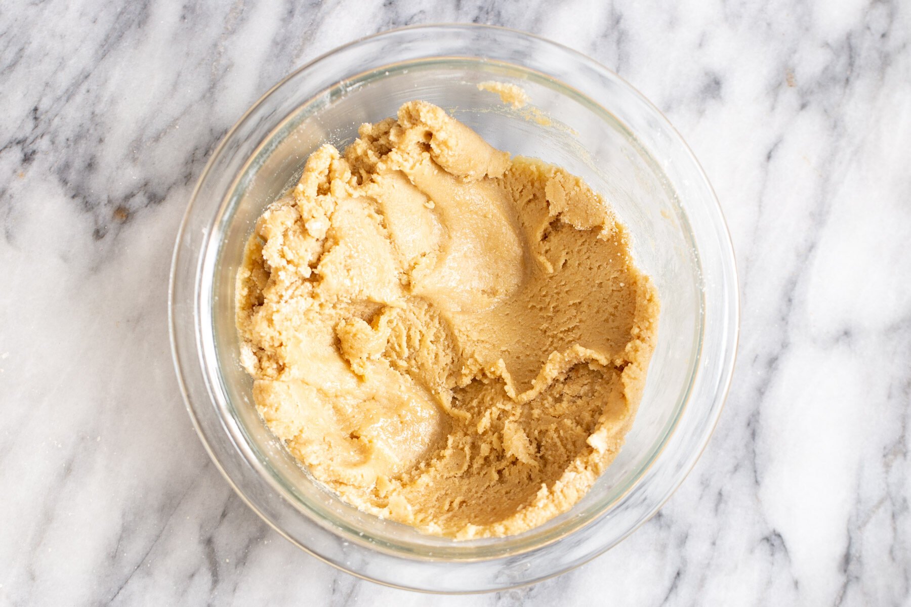 gluten free thumbprint cookies glutenfree thumbprint cookie dough in a glass bowl
