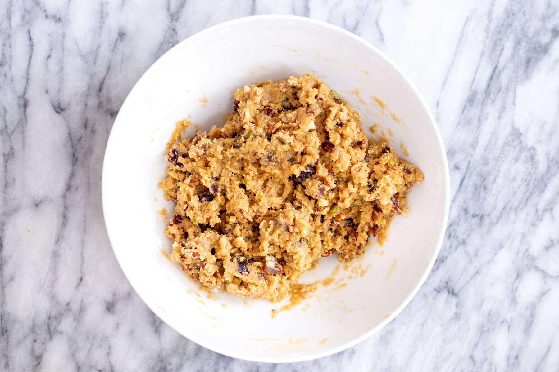 date nut cookie mix date nut cookie dough in a white bowl