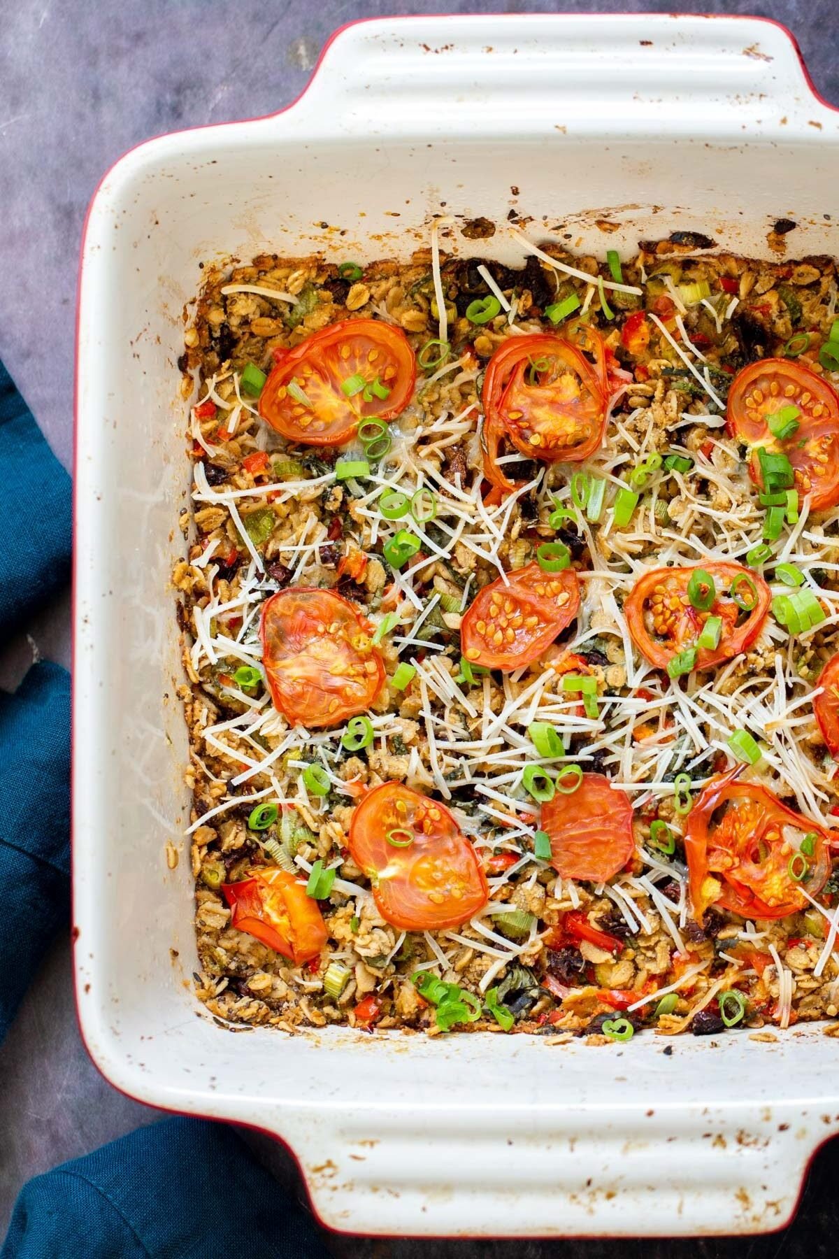 pizza oatmeal bake in a white casserole dish