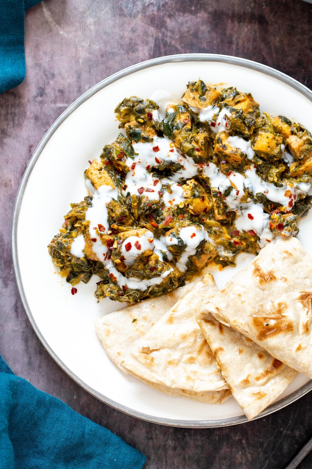 spinach tofu curry spicy Indian tofu spinach stirfry served with a side of flatbread