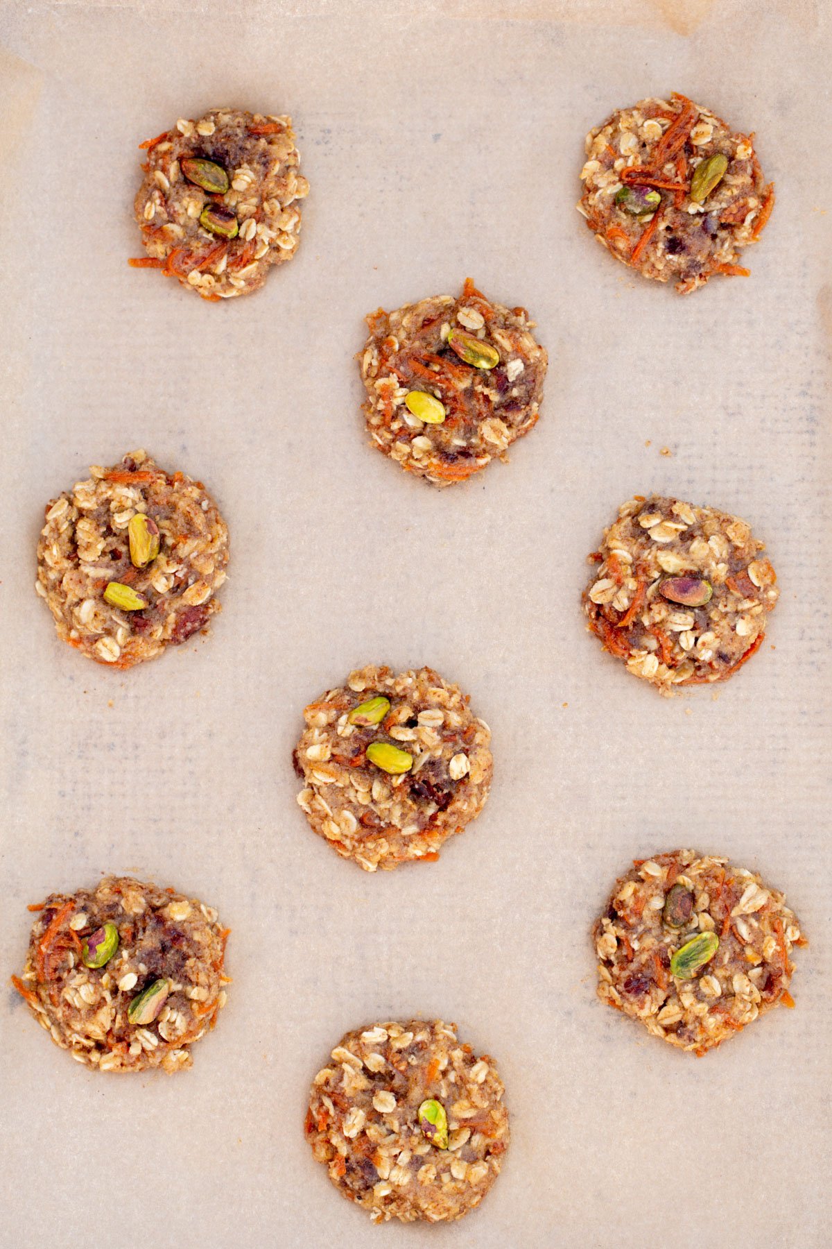 vegan carrot cake cookies  carrot cake cookies on a cookie sheet
