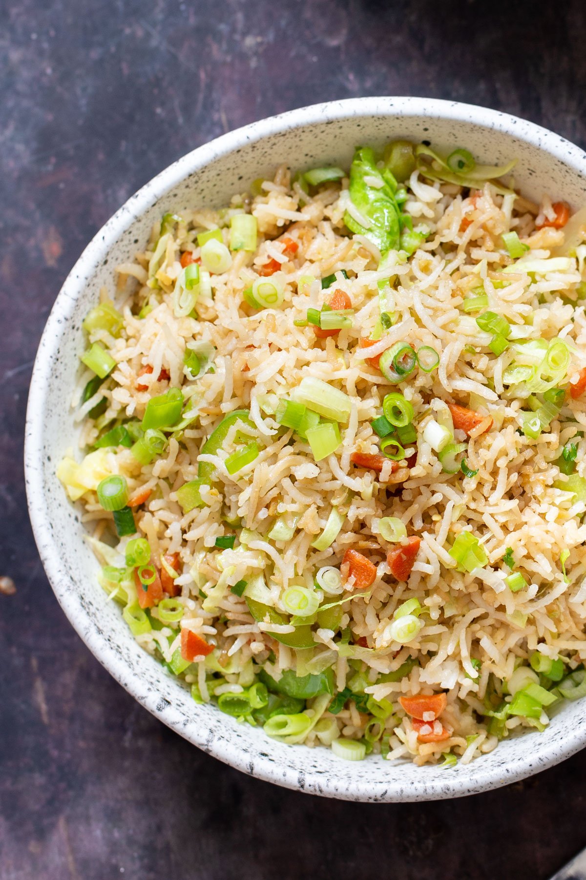 Indo Chinese Fried Rice a bowl of Indo Chinese Fried Rice served in a bowl