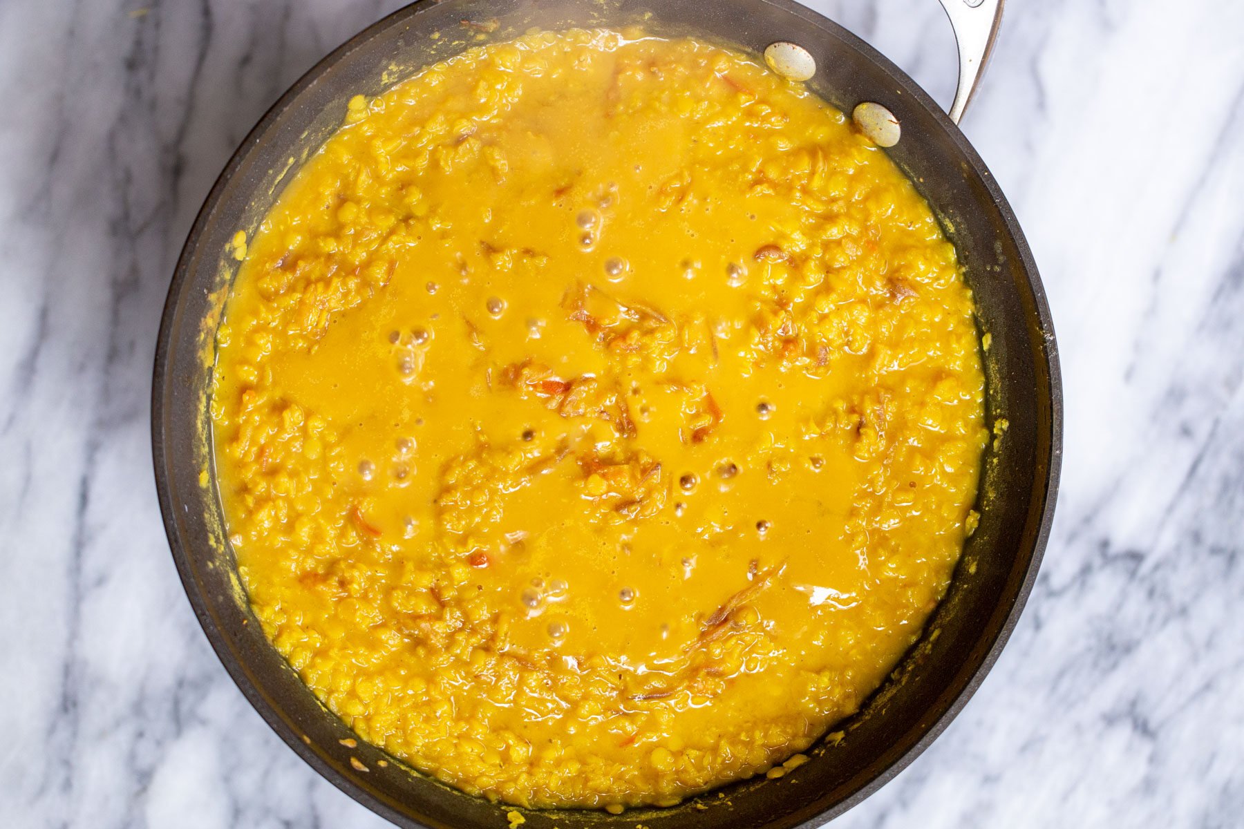 masoor dal tadka masoor dal tadka in a sauteeing pan