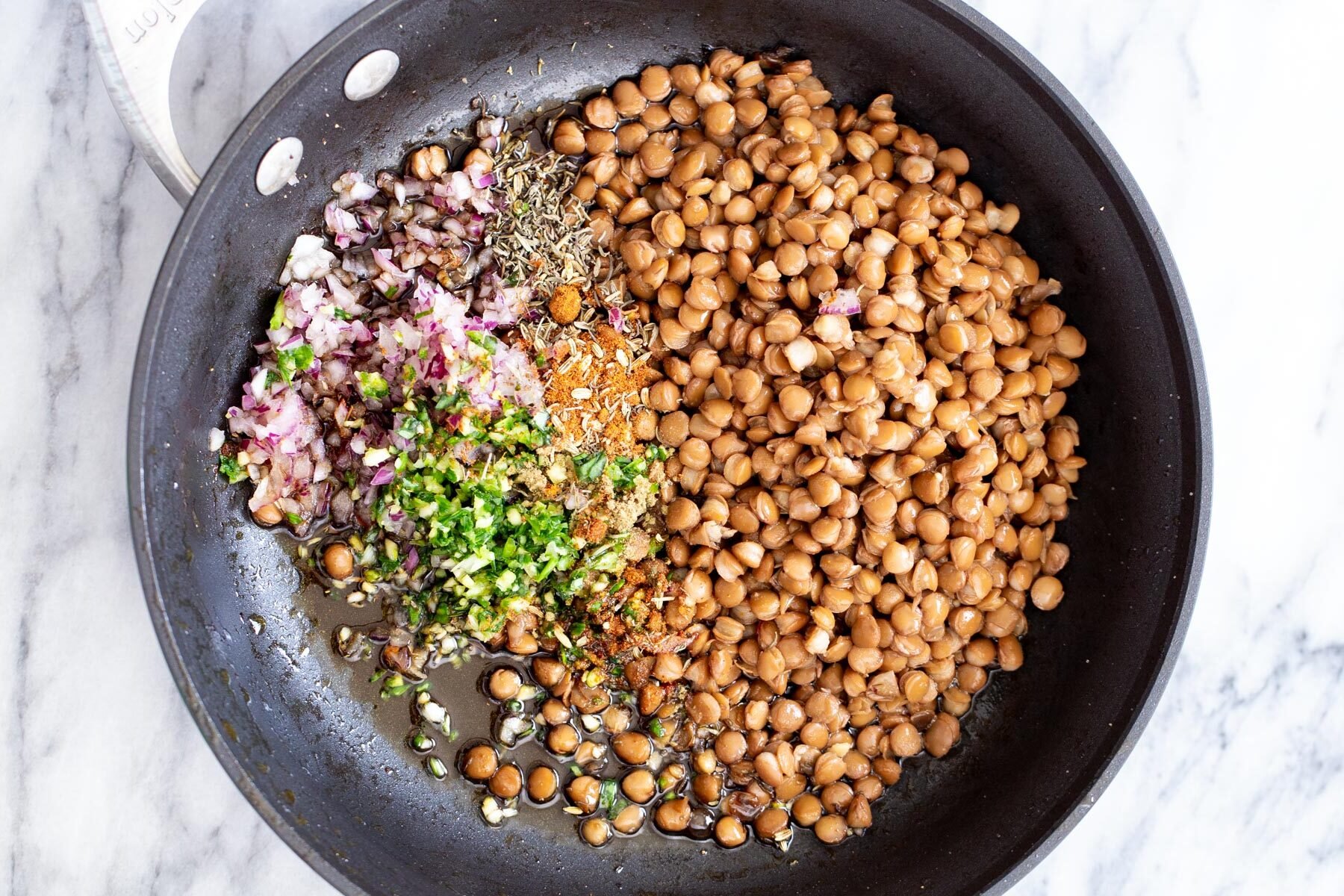 vegan lentil meat being prepared in a skillet
