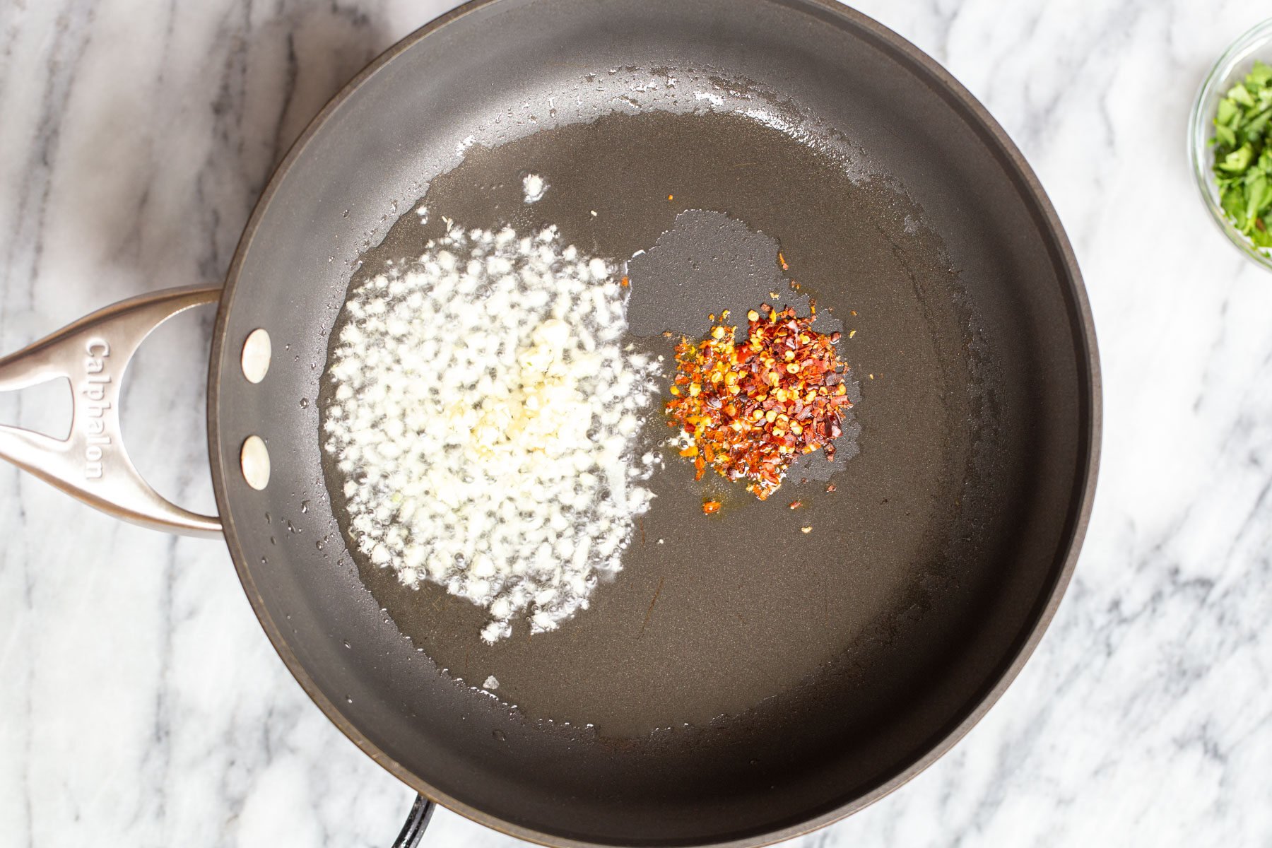 garlic and red pepper flakes in a skillet