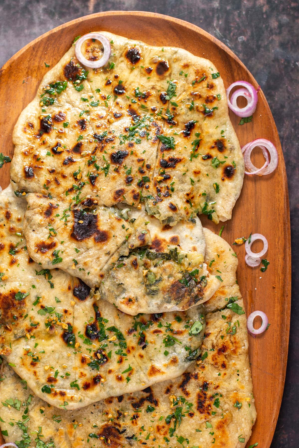 vegan potato spinach cheese stuffed naan brushed with garlic butter