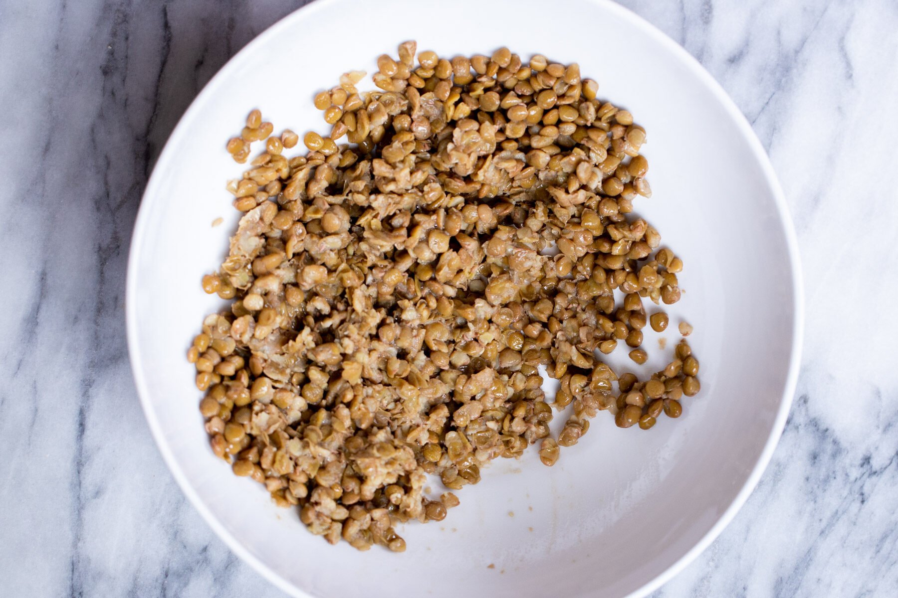 vegan meatball subs cooked lentils in a bowl