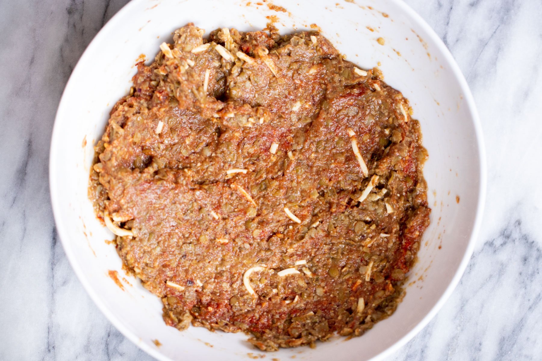 vegan meatballs mix in a white bowl