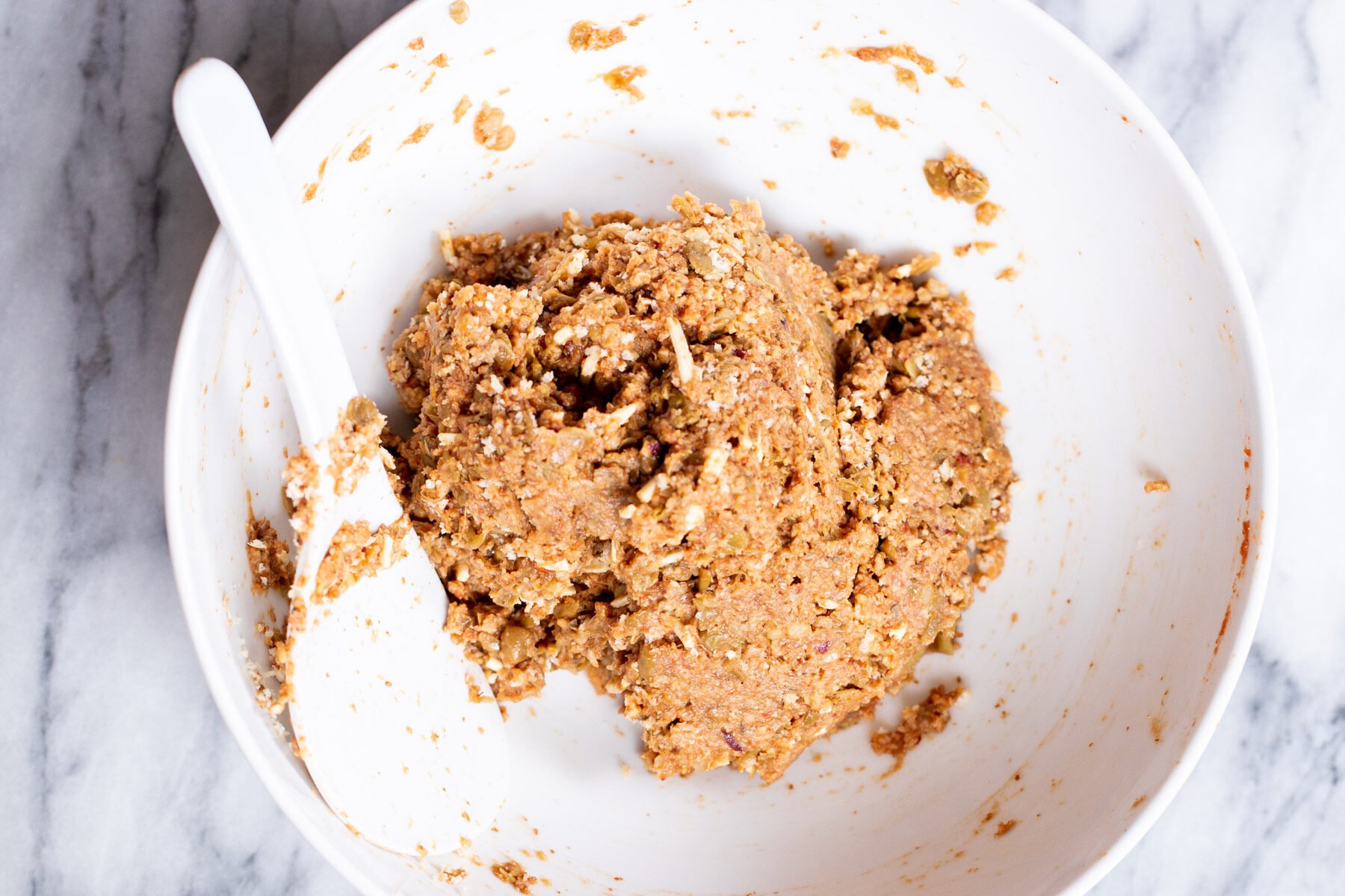 vegan meatball mixture in a white bowl