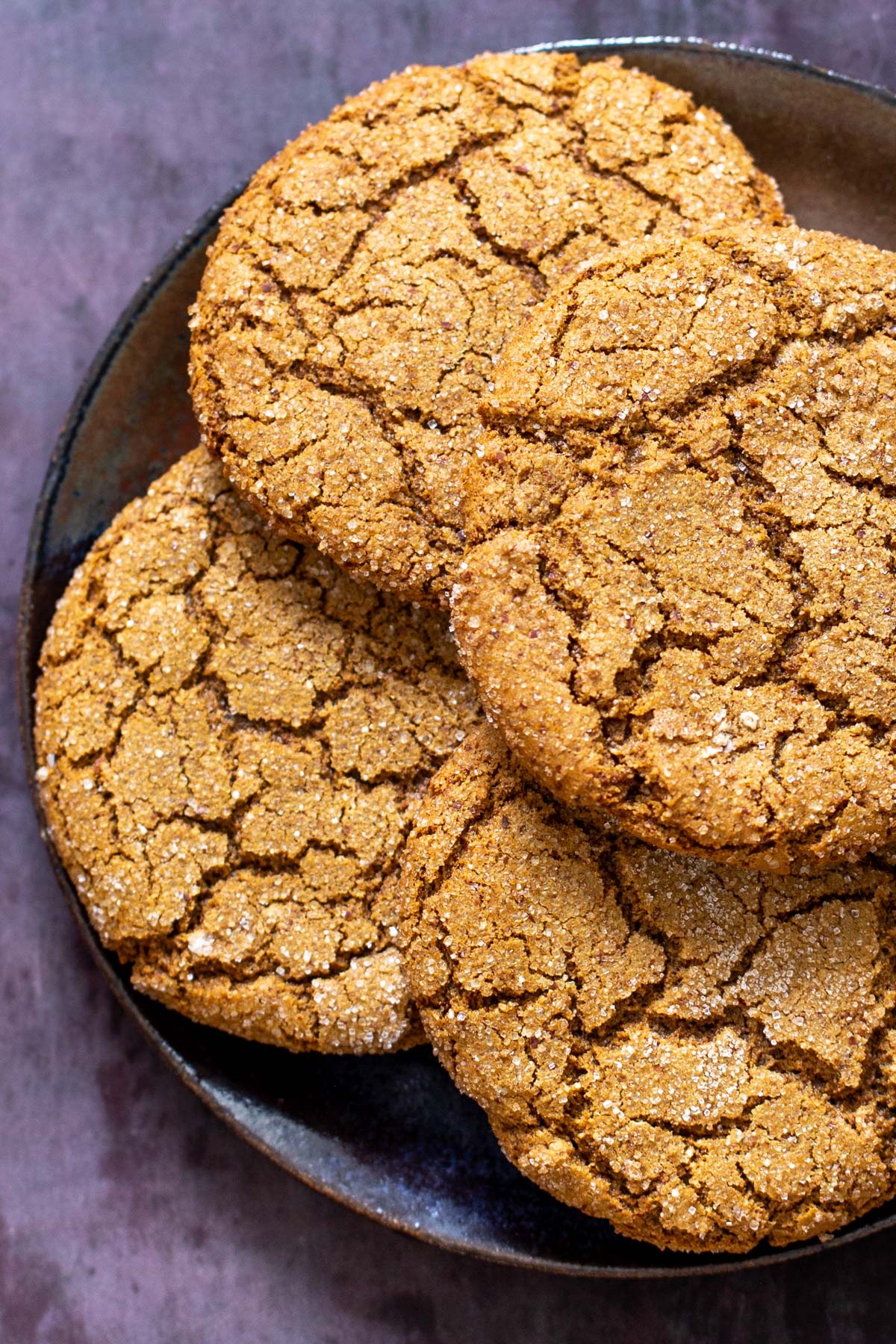 big crinkly almond flour molasses cookies on a platter