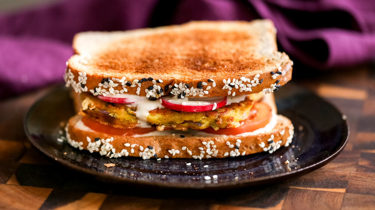 side view of a vegan chickpea flour pancake brekfast sandwich