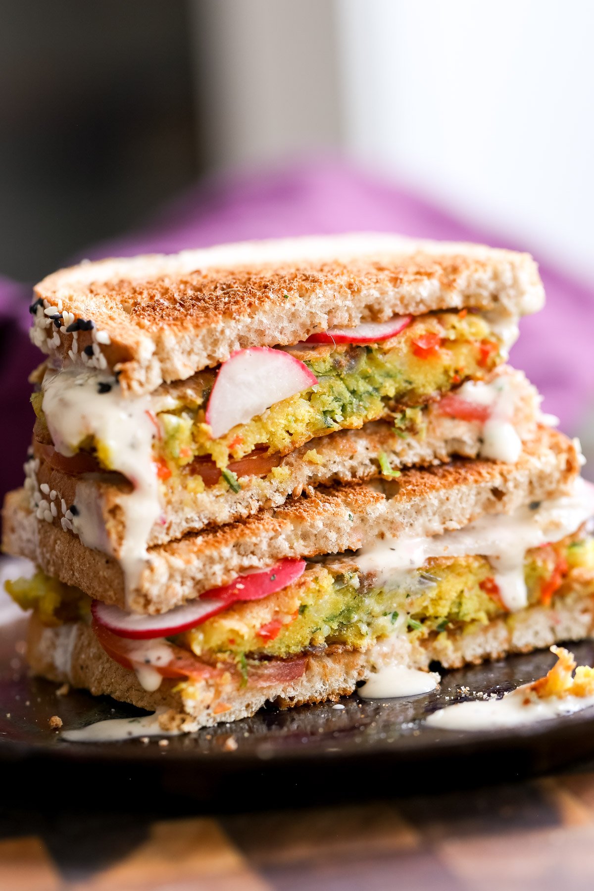 vegan breakfast sandwich with vegan chickpea flour pancakes and vegetables