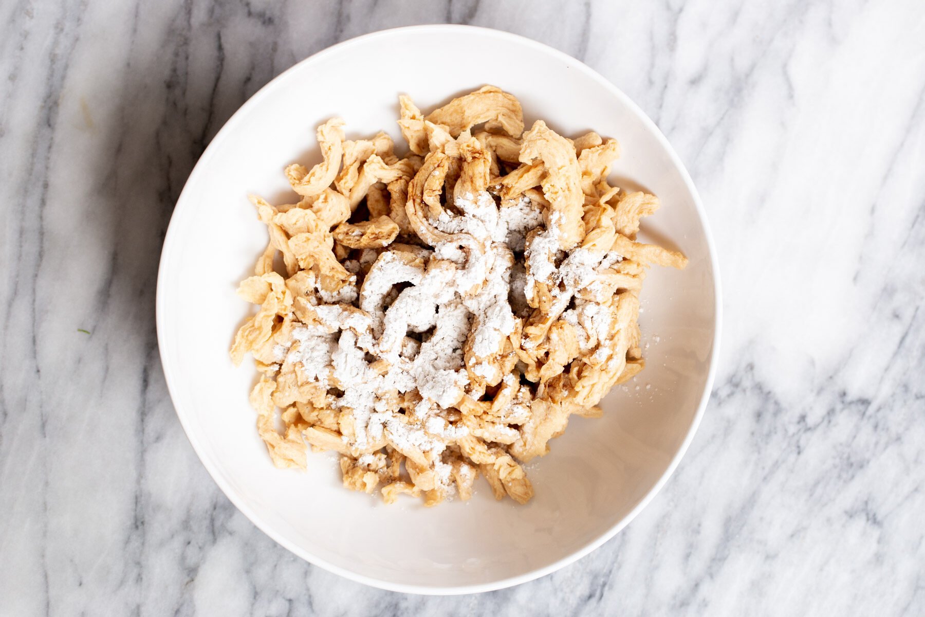 soaked vegan soycurls in a white plate