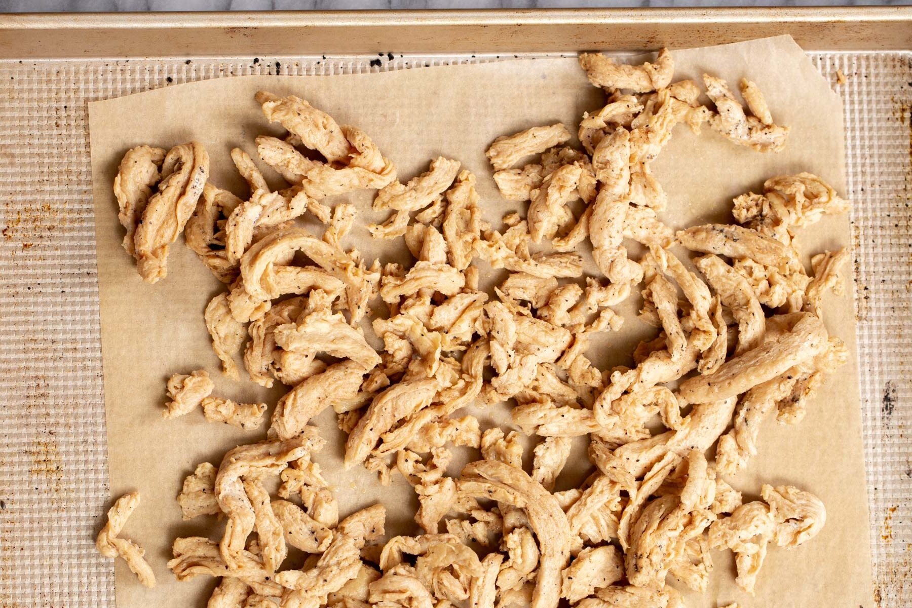 baked vegan soy curls on a baking sheet