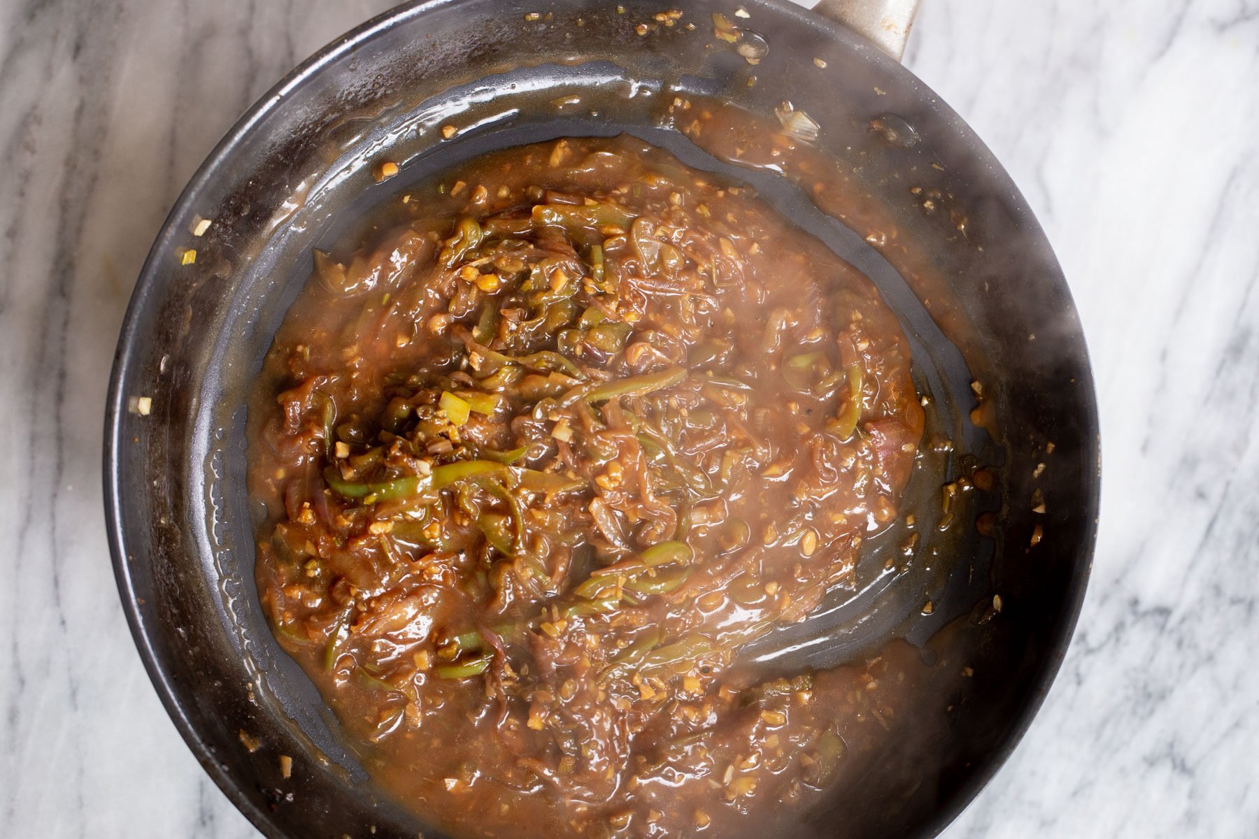 spicy Indo Chinese green chilli sauce in a skillet