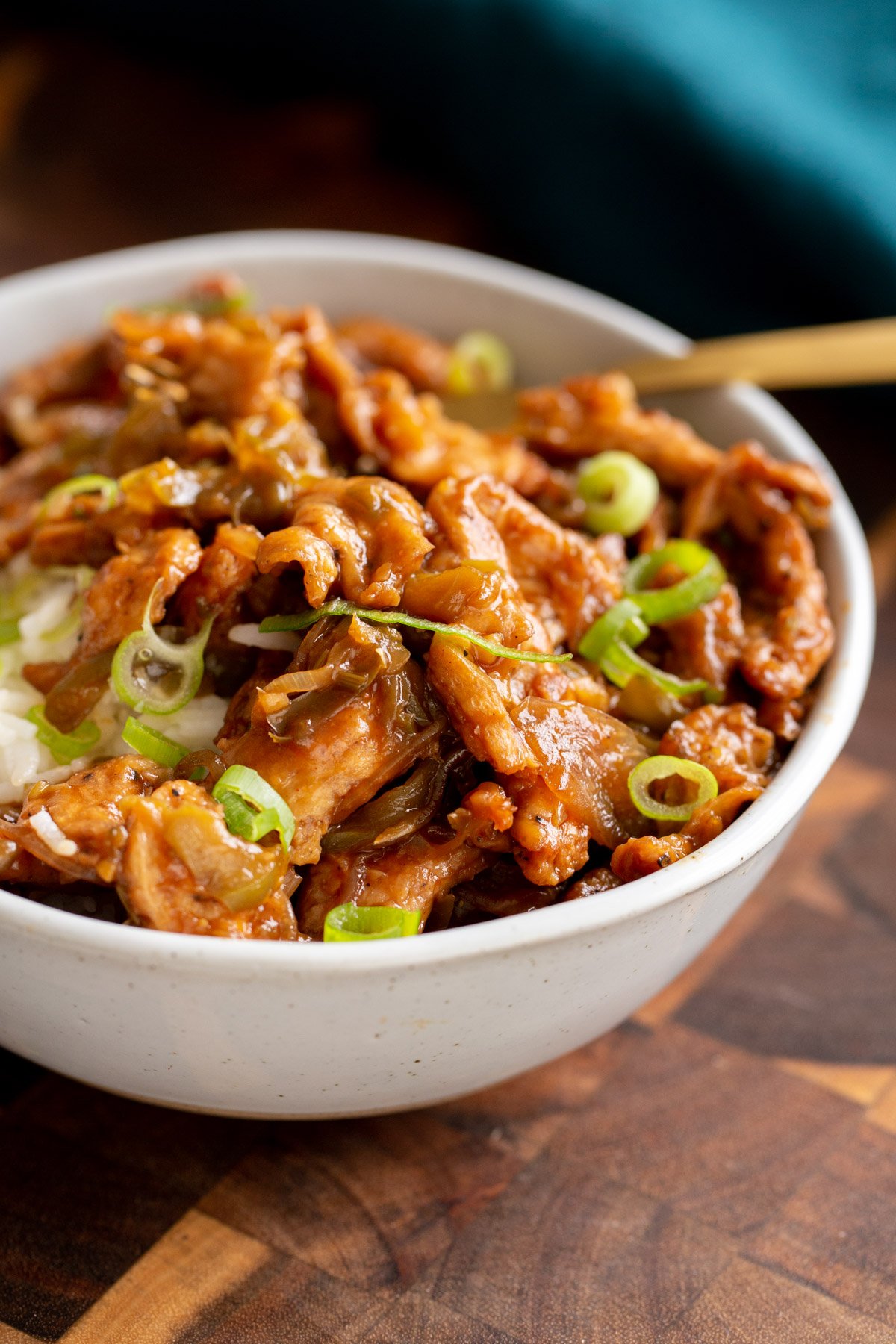 side view of vegan chili chicken sprinkled with green onions