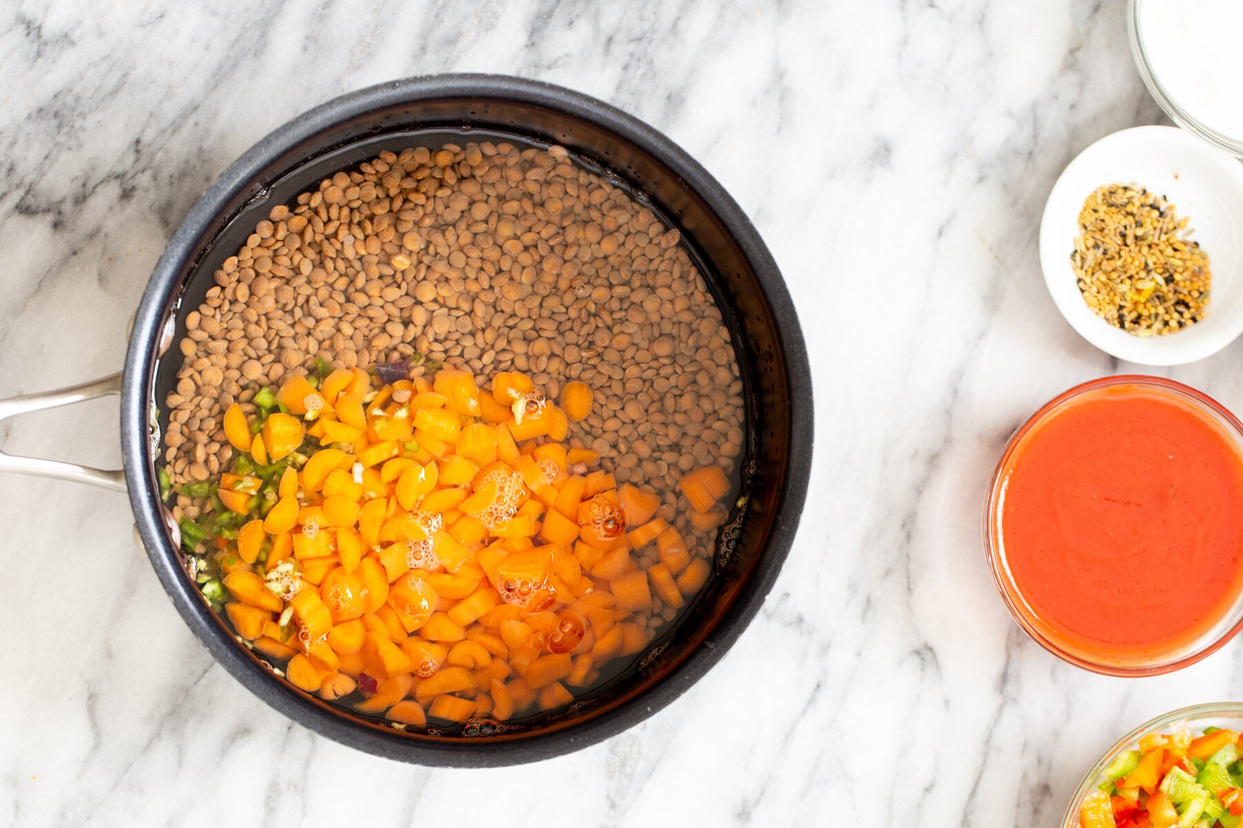 lentils and root vegetables in a skillet