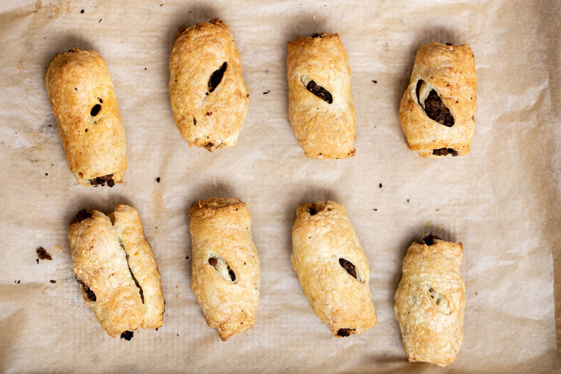 vegan sausage rolls on parchment paper 