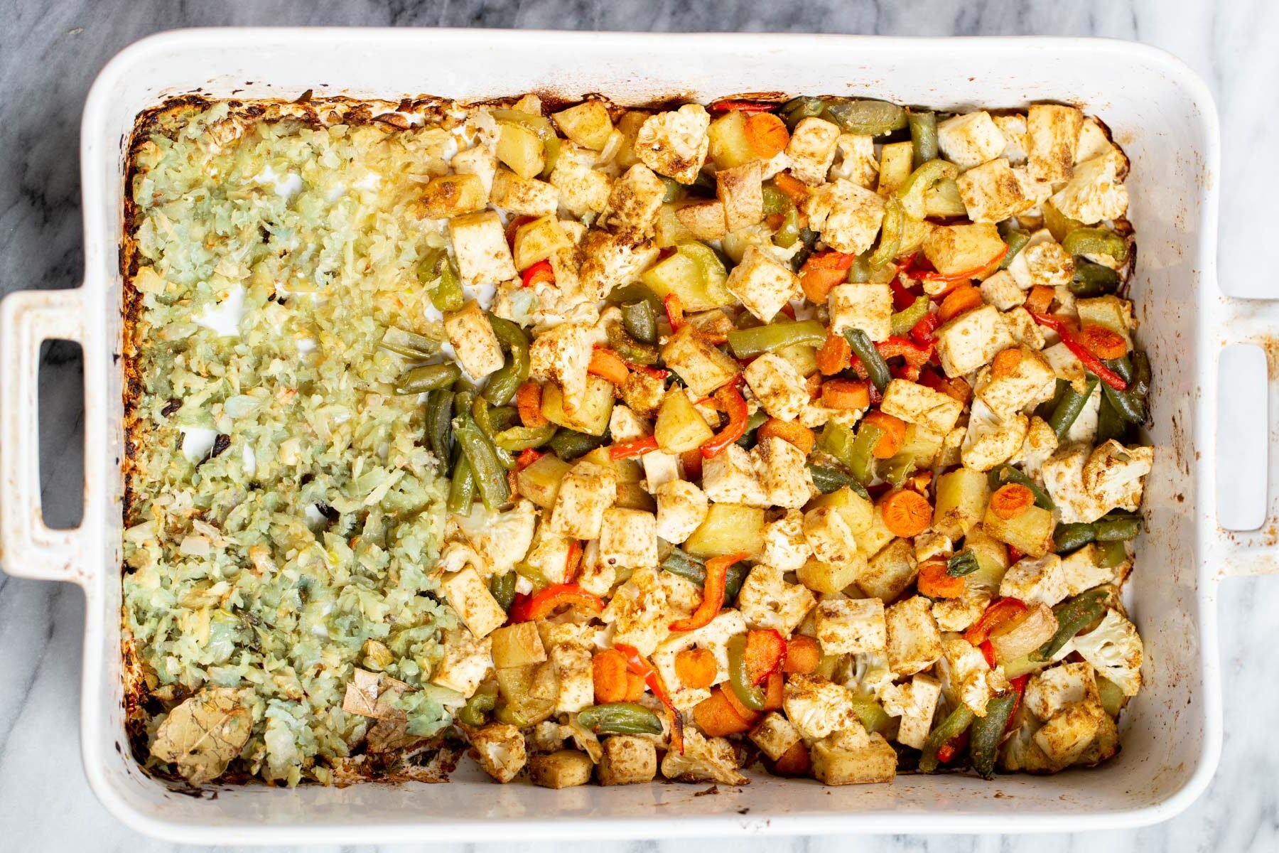 minced ginger and garlic in a white casserole dish