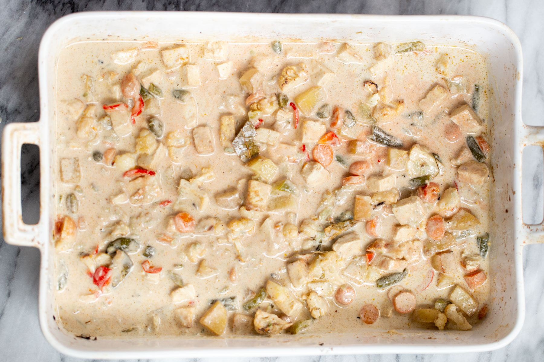 Navratan Korma  Navratan Korma in a white casserole dish