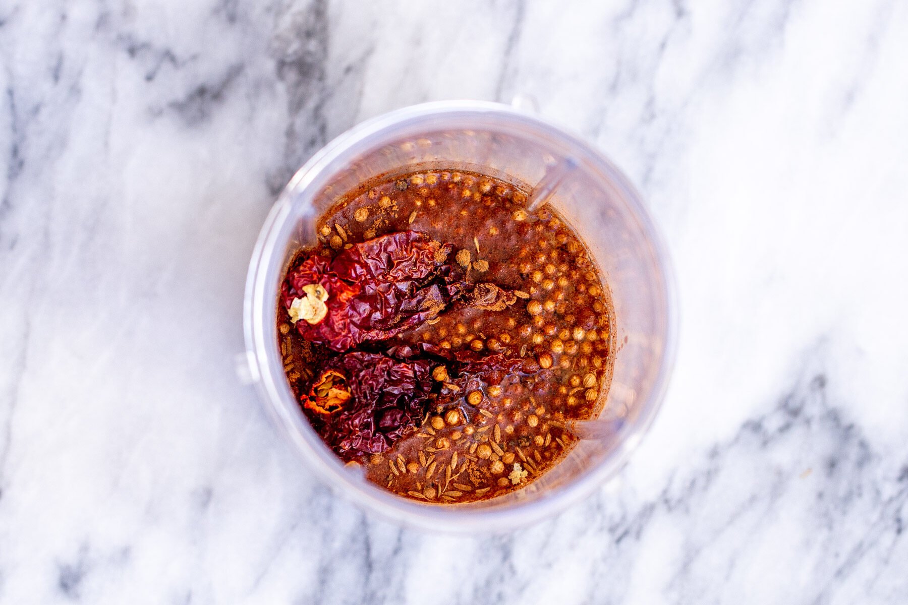 ingredients for vindaloo chili paste in a small container