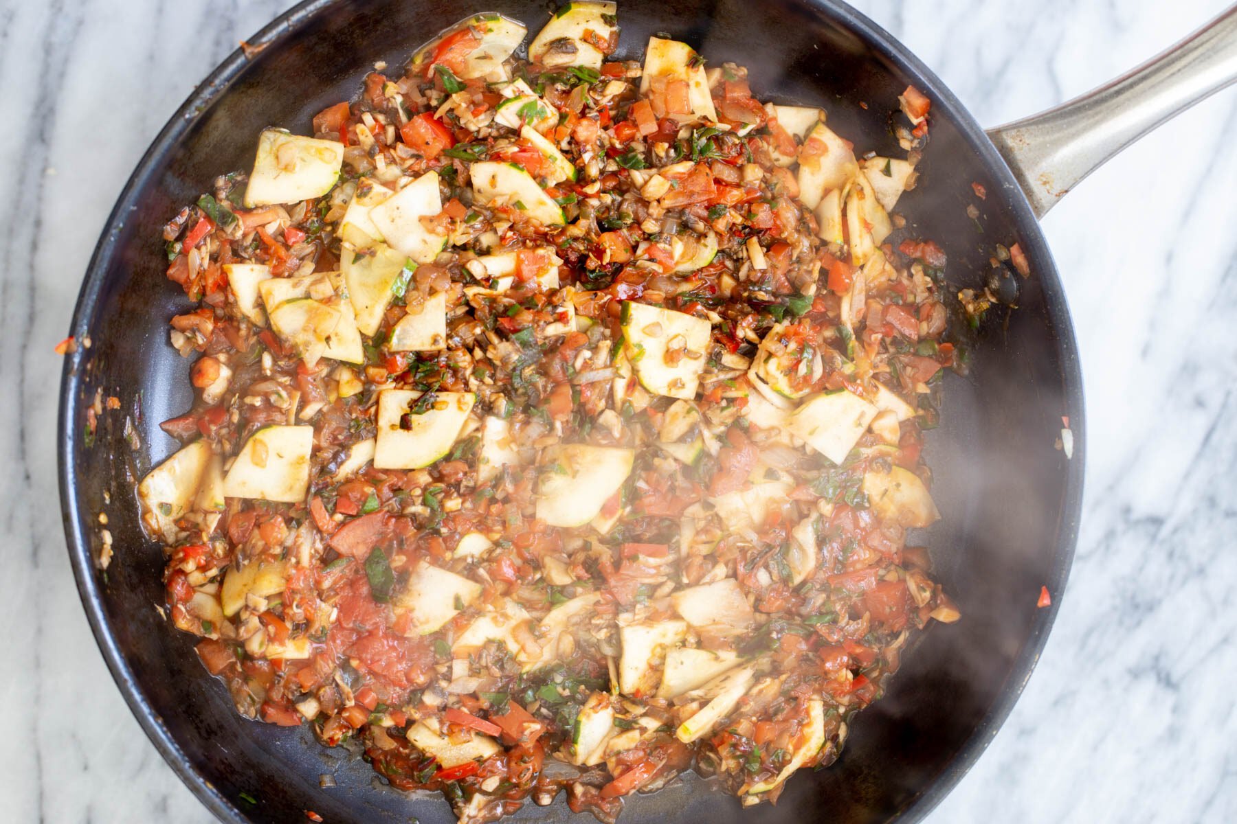 sauteeing pan with veggies