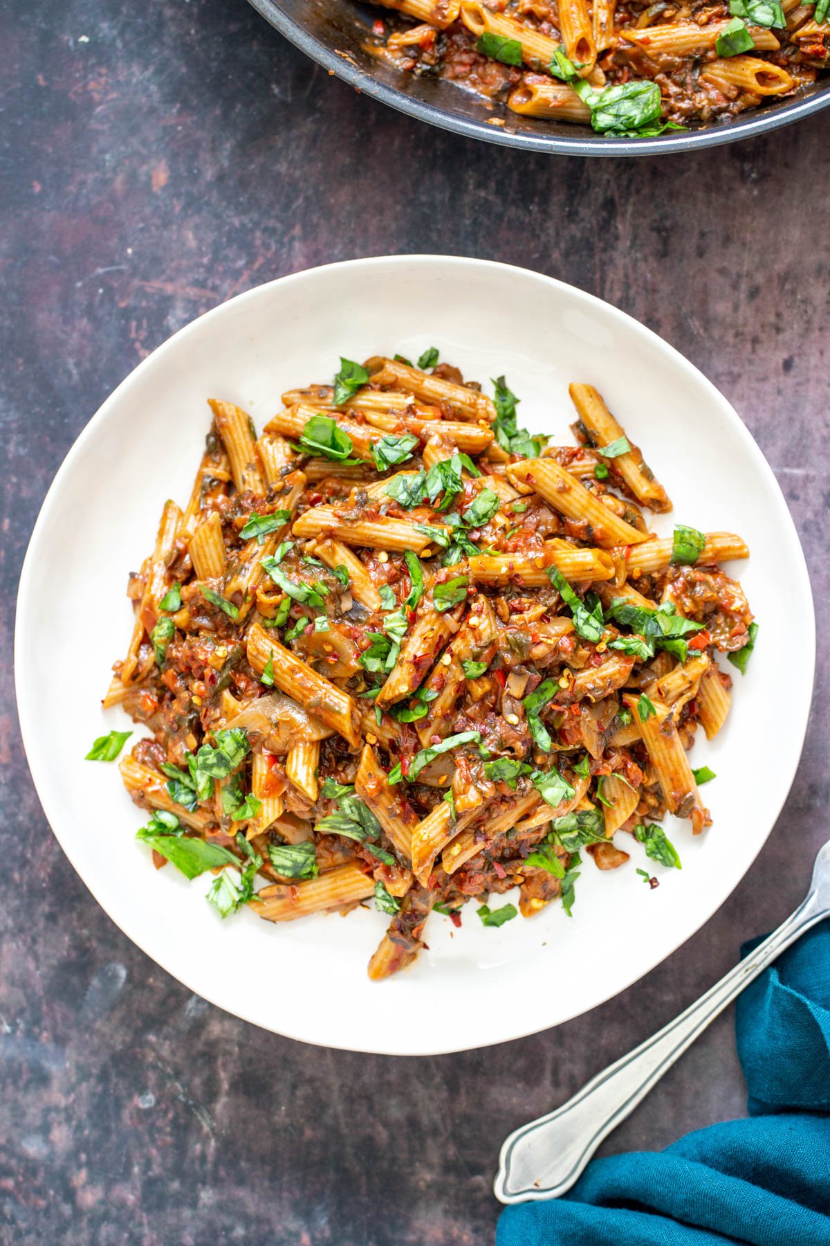 plate with veggie pasta in vegetable sauce