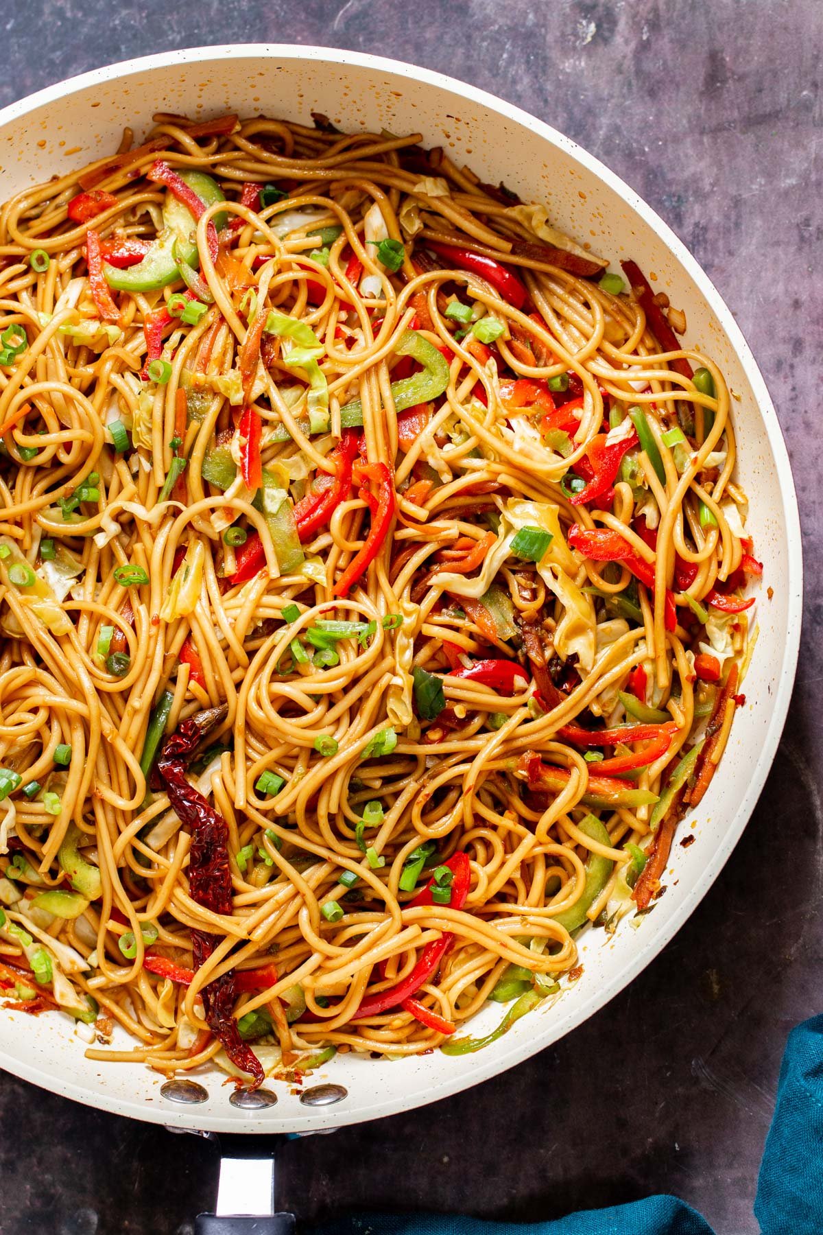 Indo Chinese Vegan Chilli Garlic Noodles in a white skillet