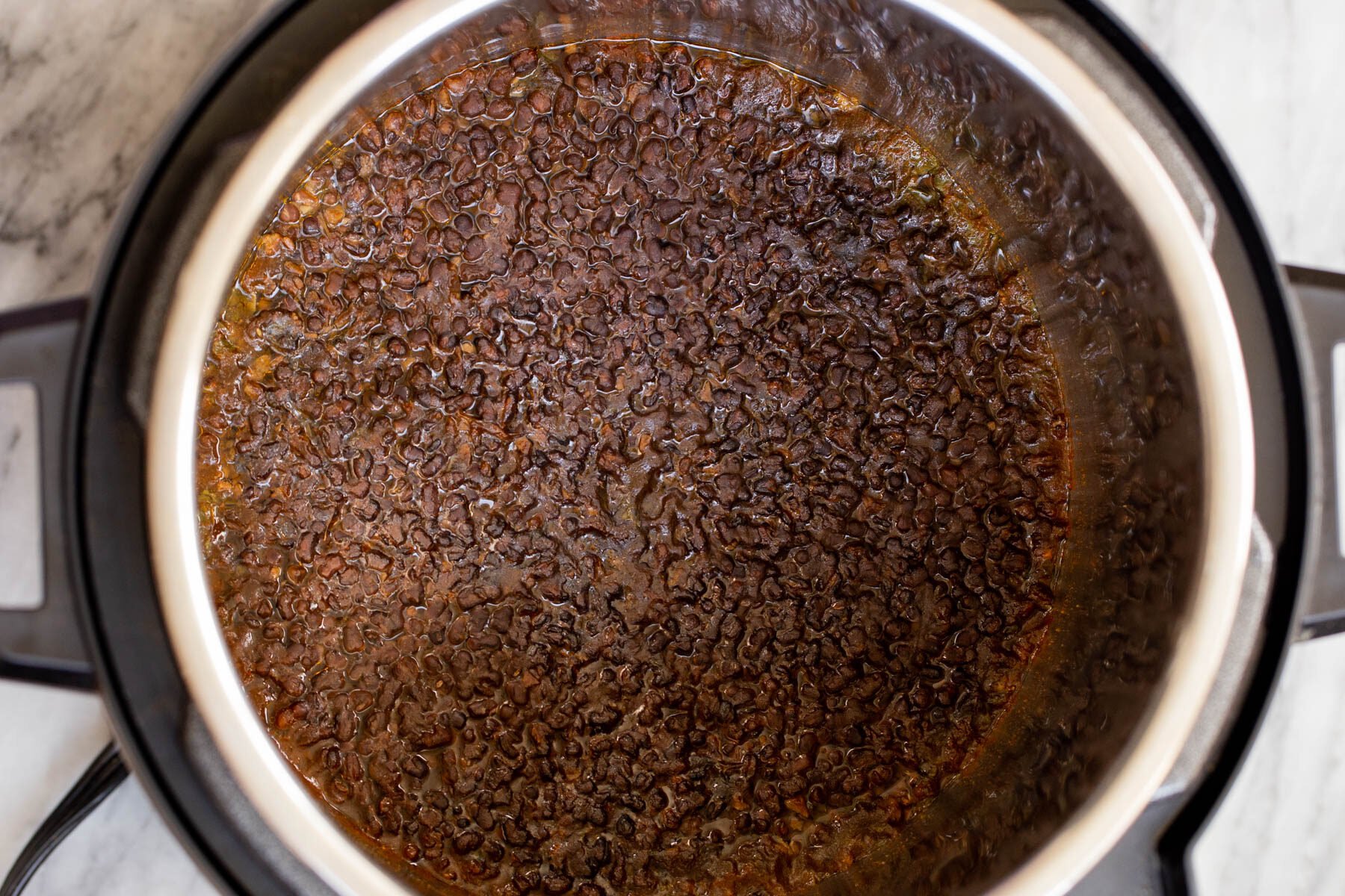 cooked black gram in an Instant Pot
