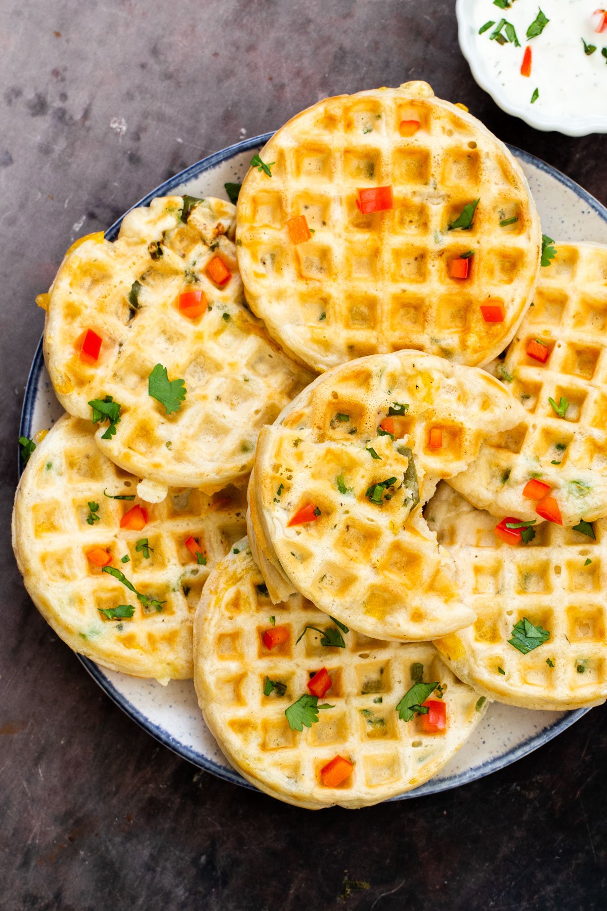 a plate of vegan cheddar jalapeno waffles