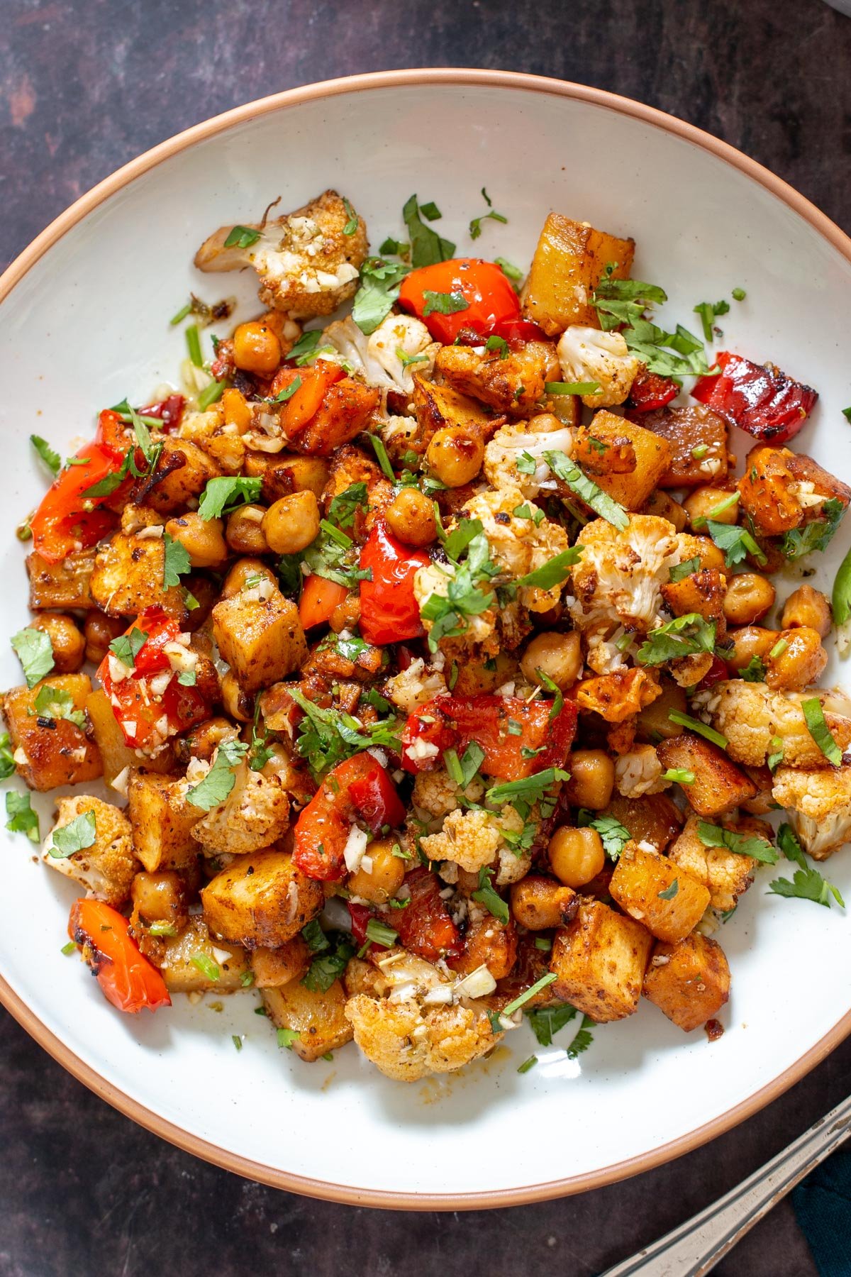 a plate with balsamic and maple roasted root vegetables and chickpeas