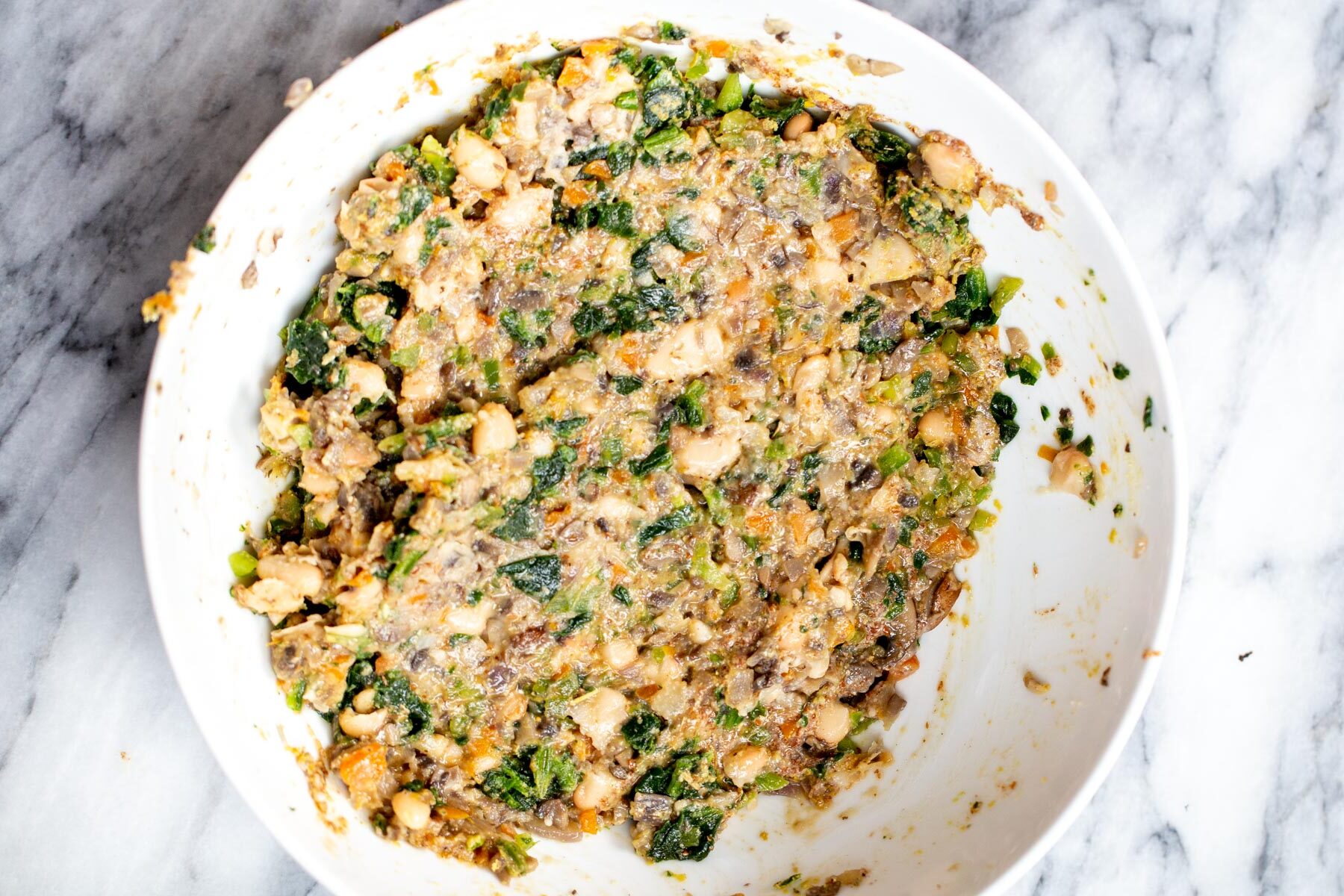 vegan savory veggie tart filling in a sauteeing pan