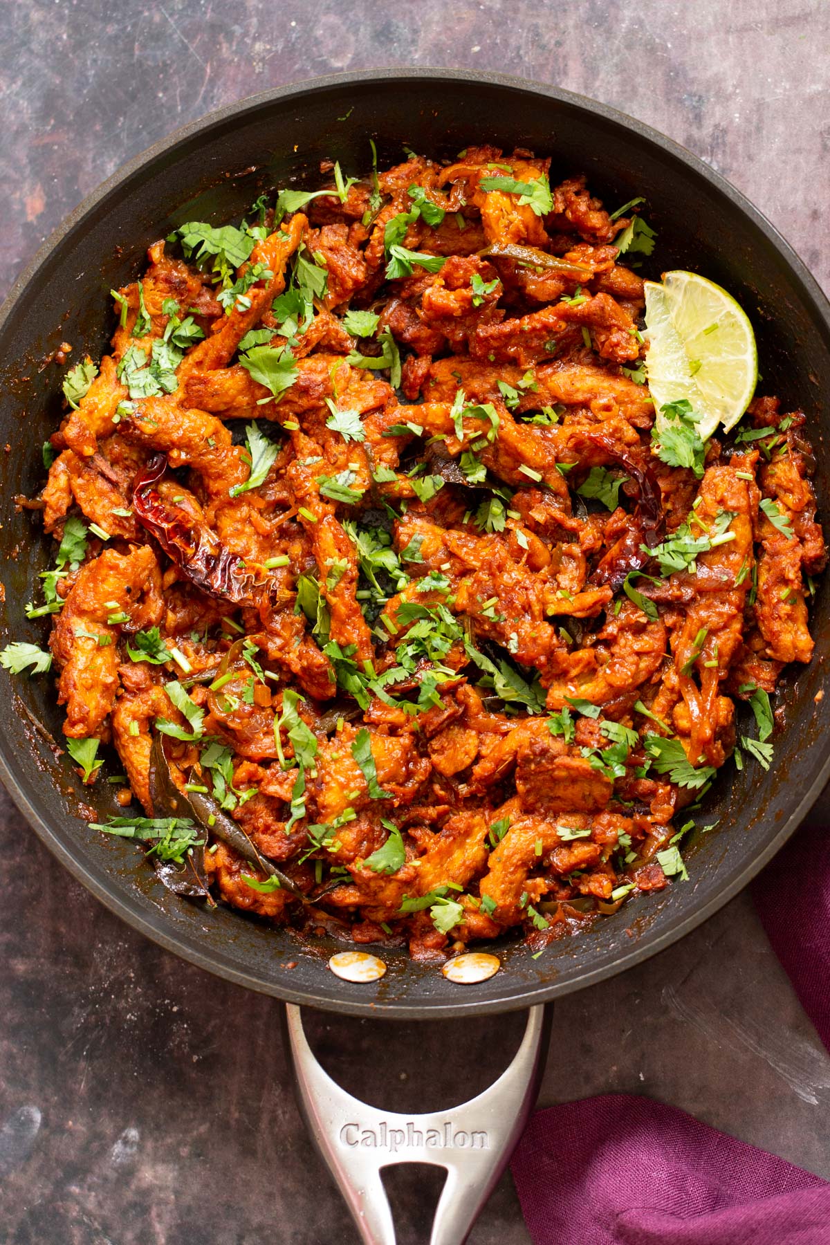 overhead shot of a frying pan with vegan chicken kondattam