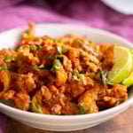 side view of a bowl of vegan chicken kondattam